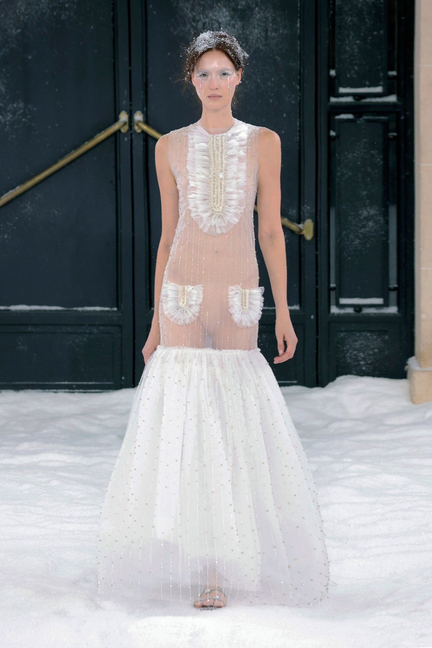 white sheer pleated gown