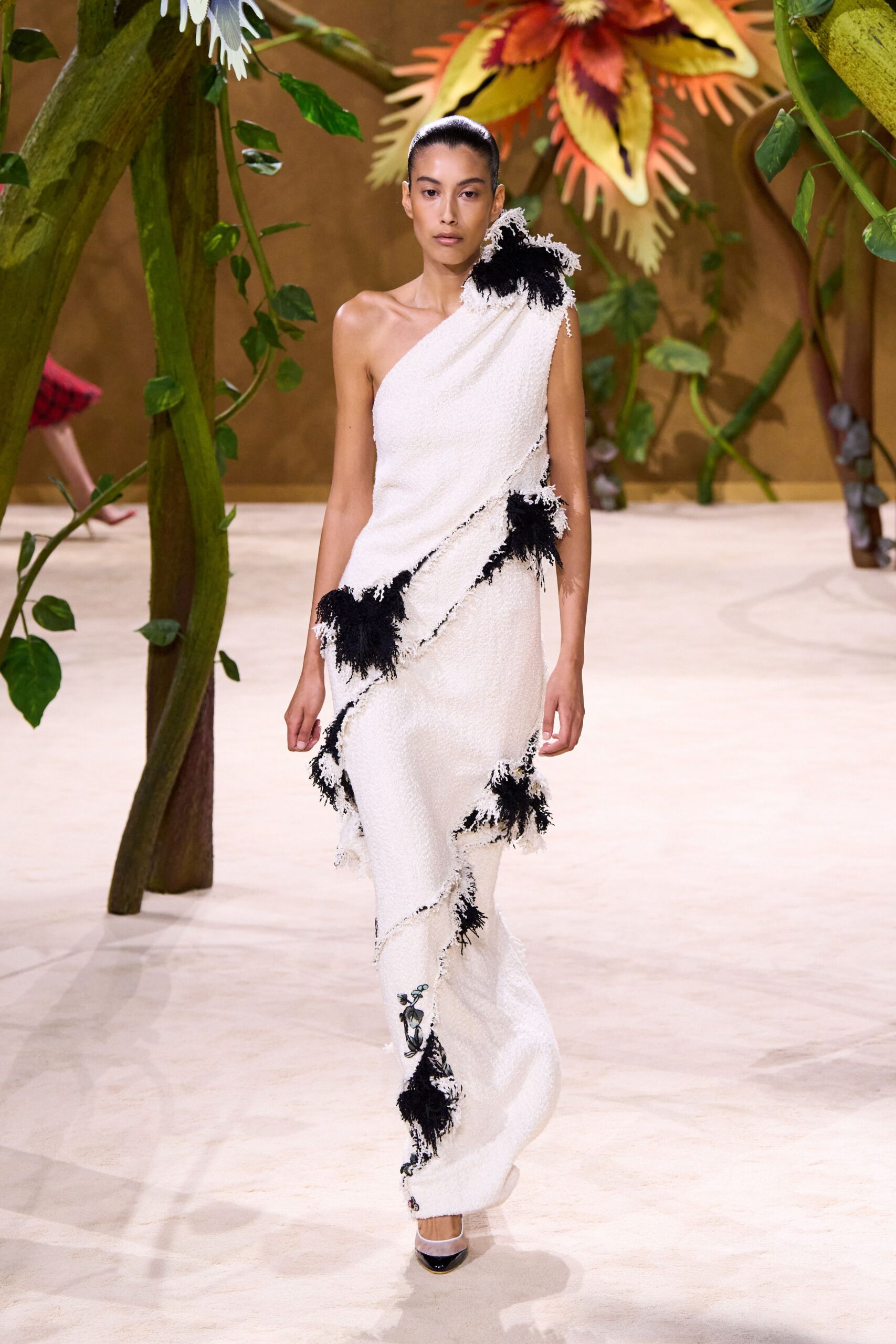 white silk sleeveless asymmetric fitted ruffled embellished gown
