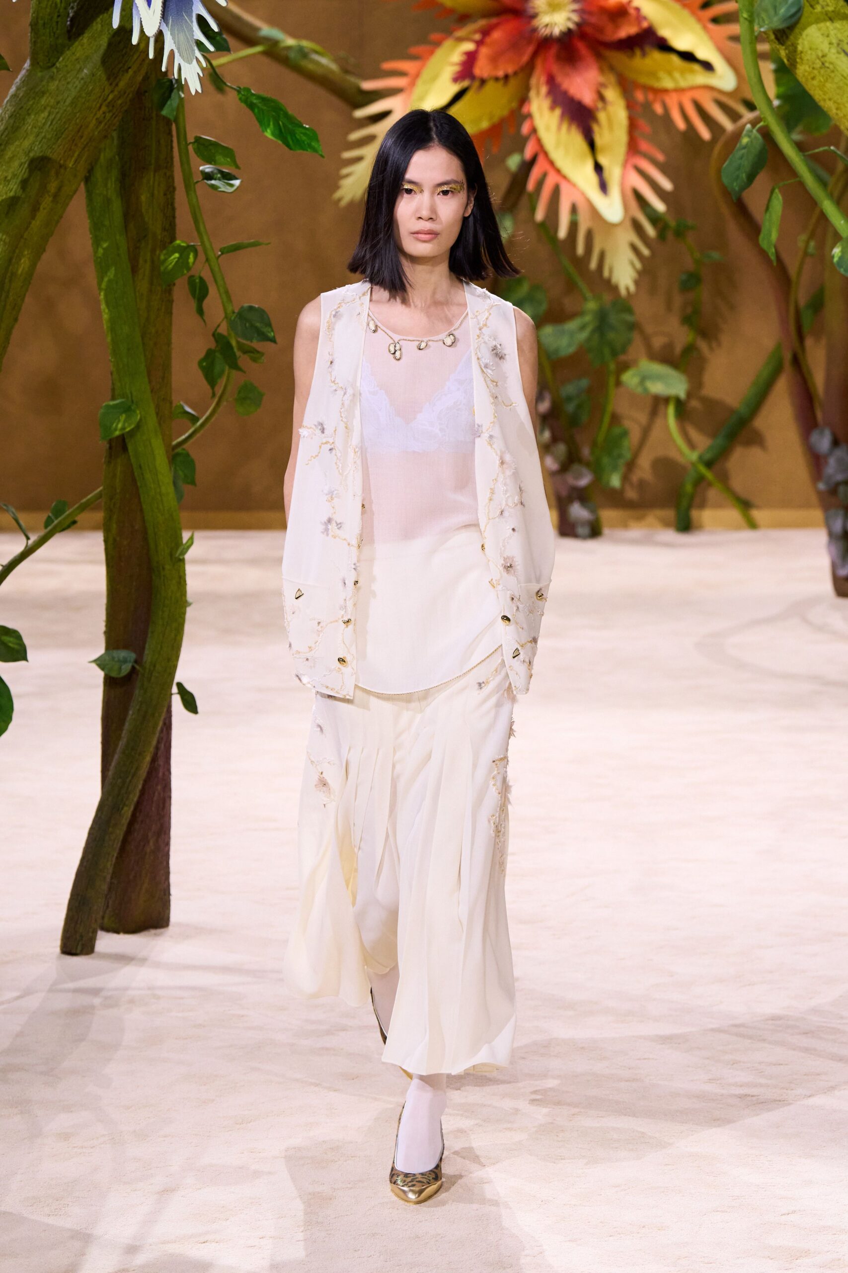 white silk sleeveless v-neck fitted embroidered blouse