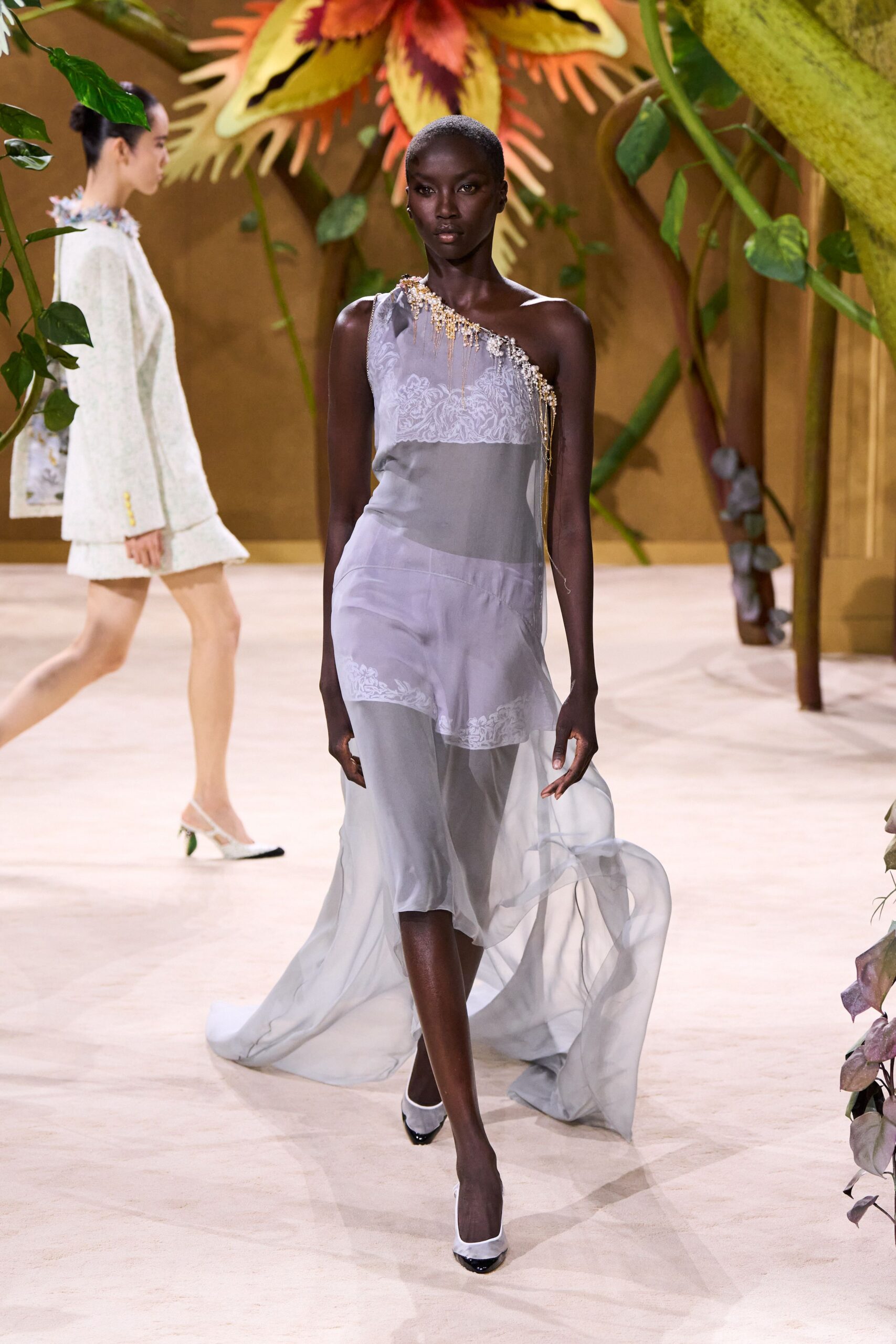 gray silk sleeveless v-neck fitted layered embroidered gown