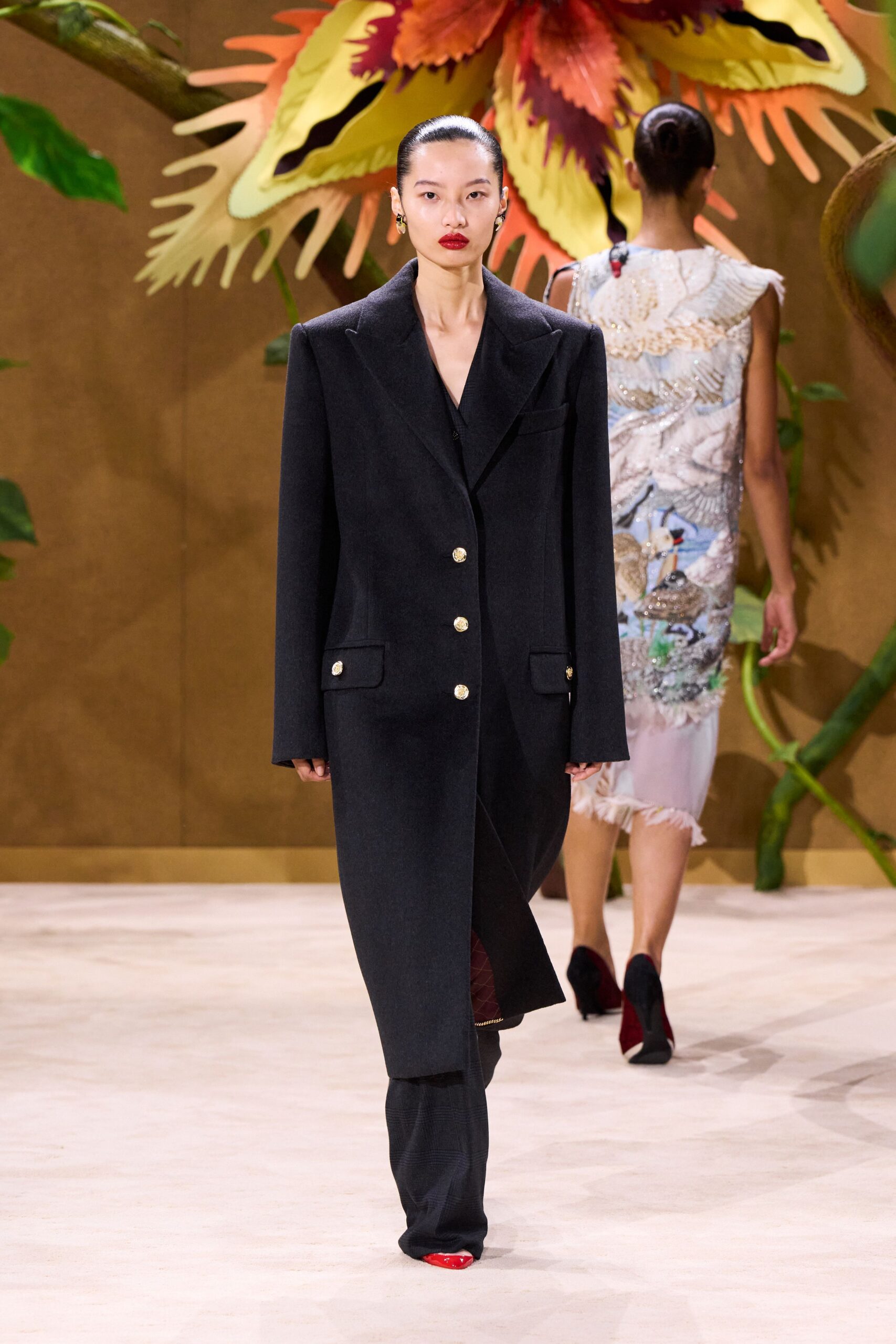 black wool long-sleeve collared structured buttoned coat