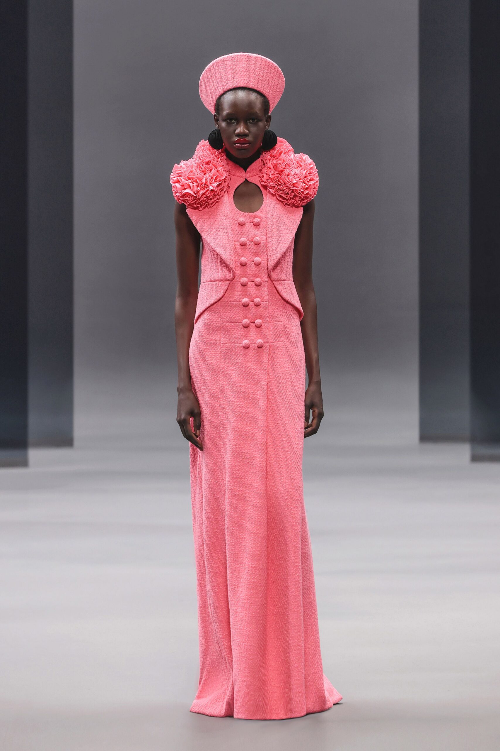 pink cotton sleeveless high-neck fitted buttoned pleated gown