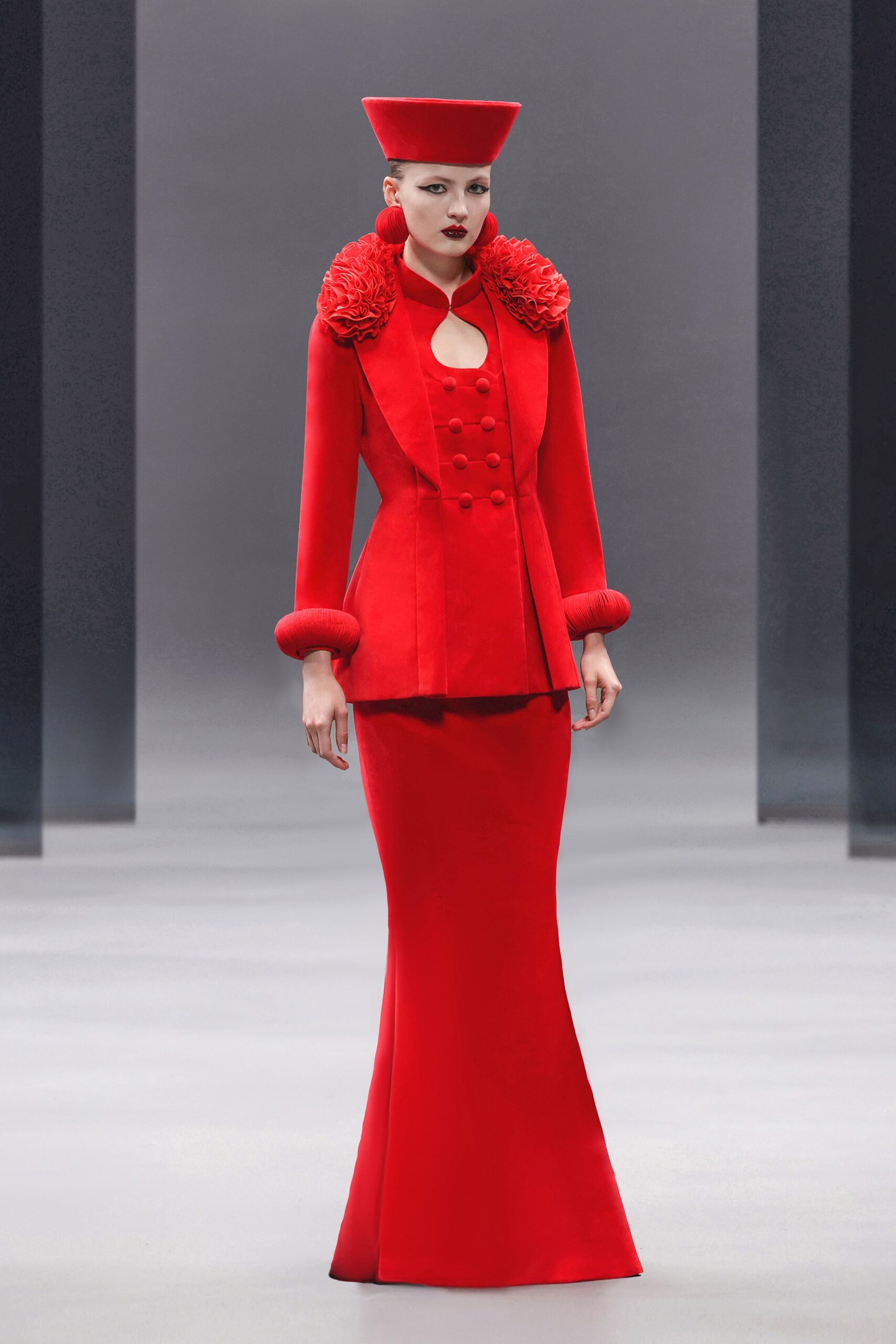 red silk fitted jacket and skirt