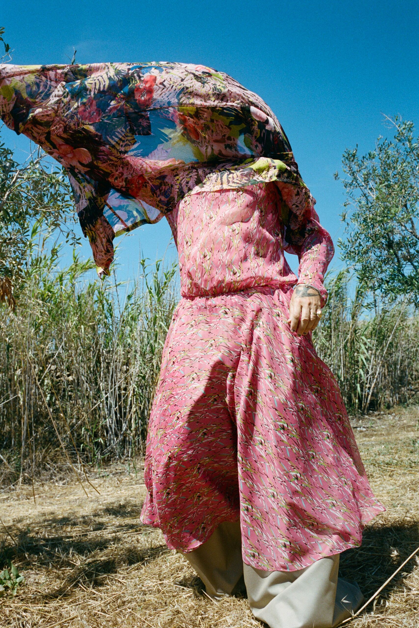 pink floral midi dress with beige pants