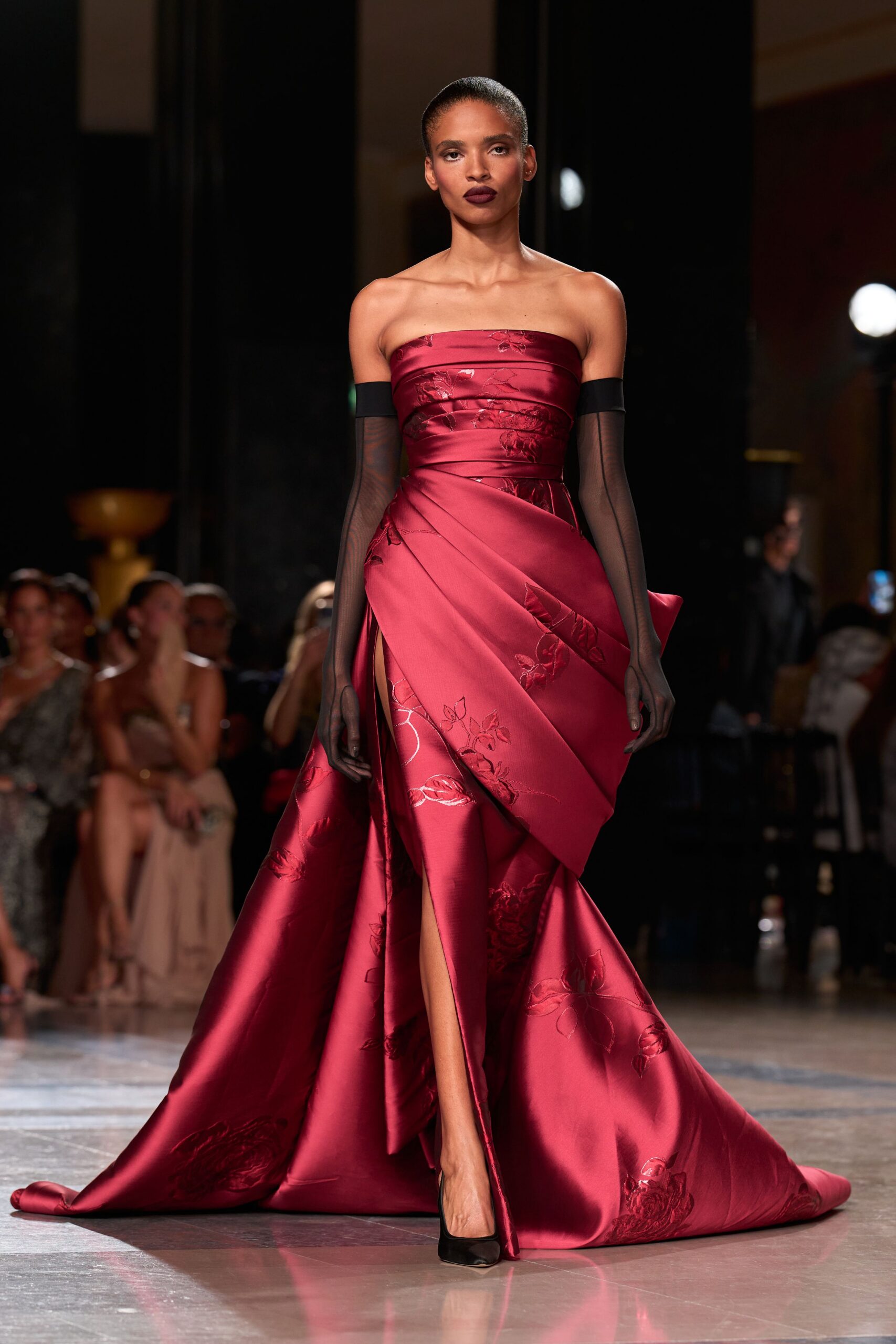 red satin strapless high-neck fitted pleated embellished gown