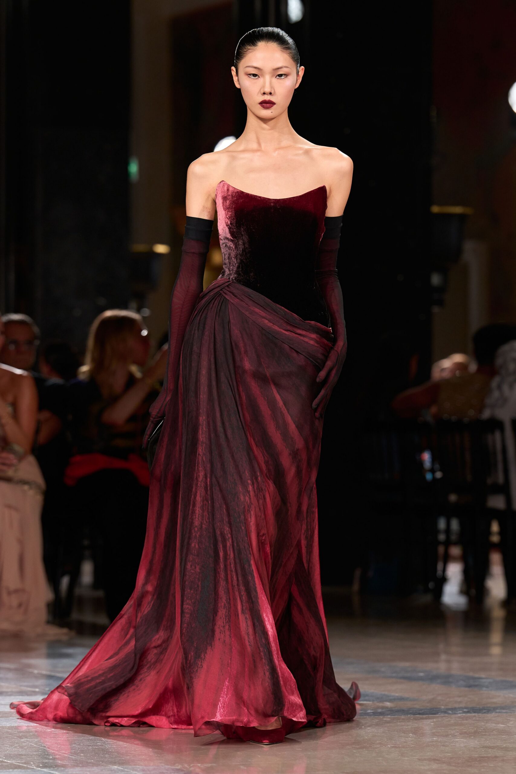 red silk strapless fitted draped flowing maxi gown