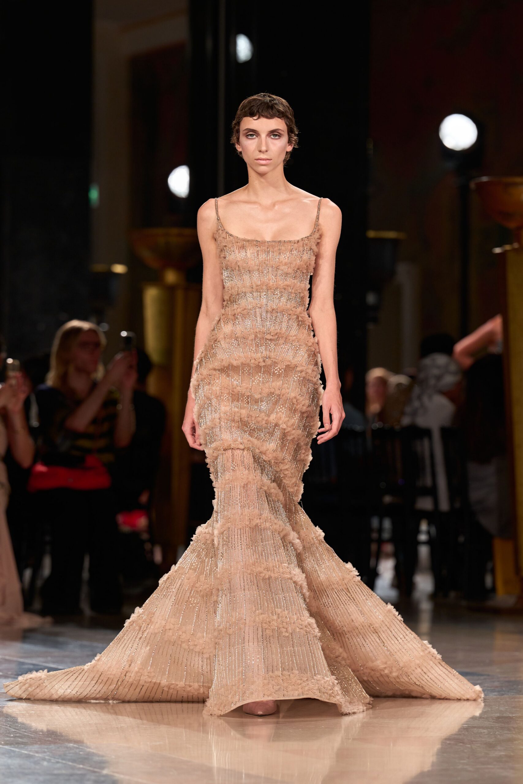 beige silk sleeveless v-neck fitted pleated flowing gown