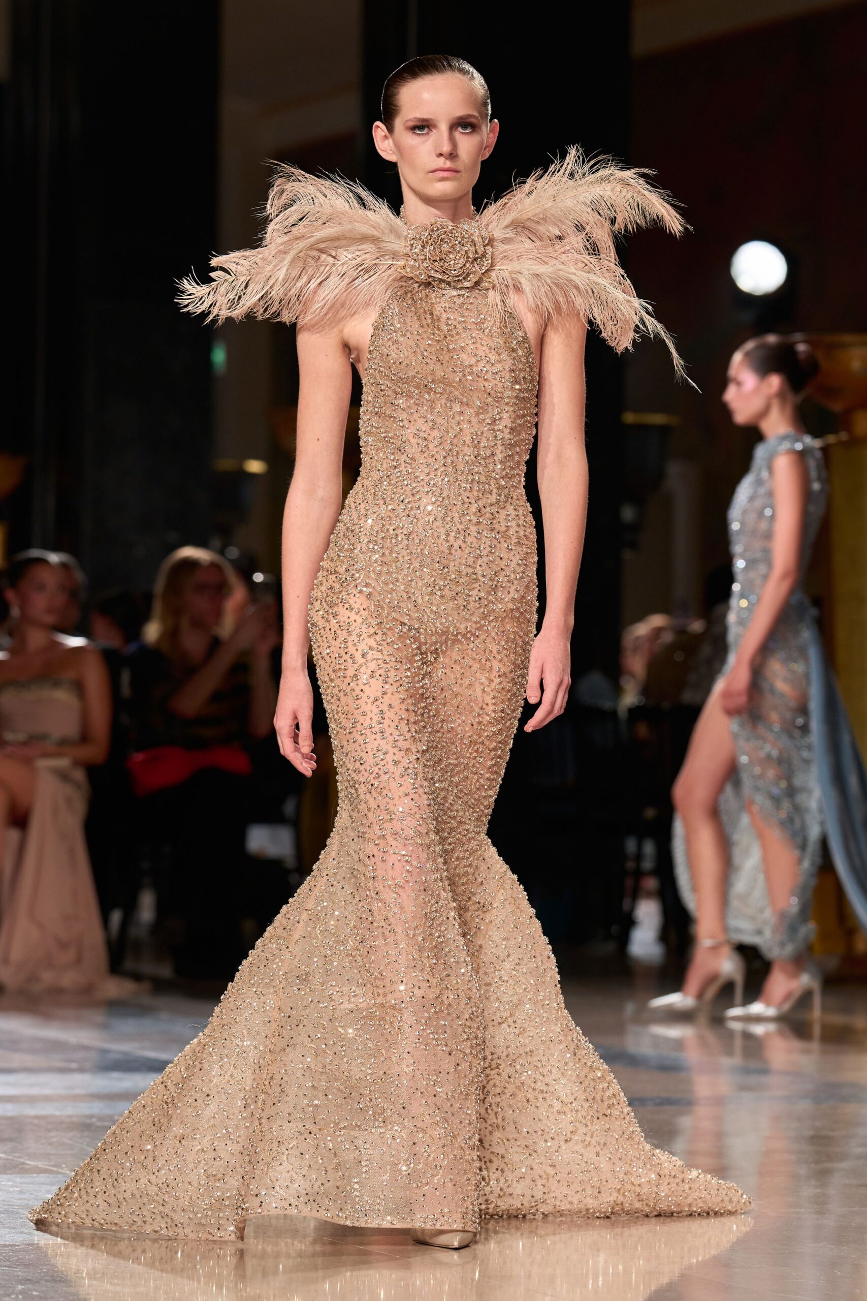 beige sequined sleeveless gown