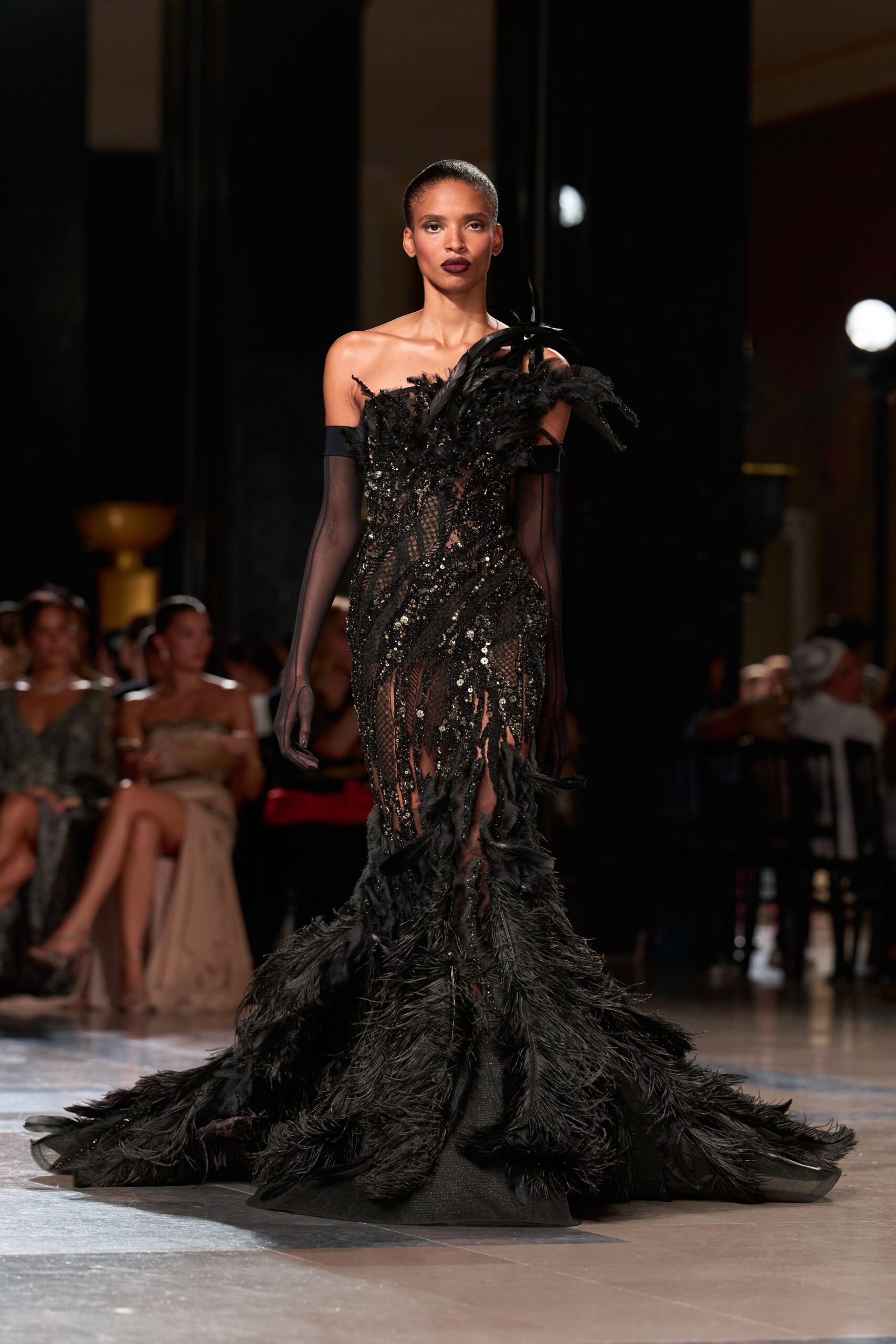 black feather embellished gown