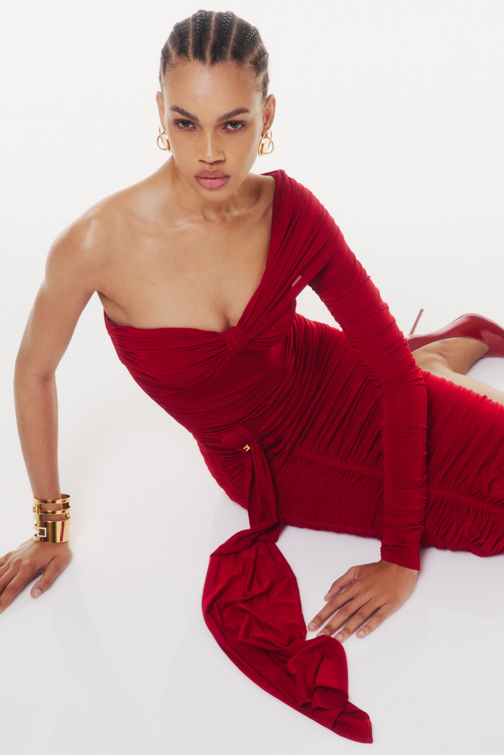 red silk sleeveless off-shoulder fitted ruched dress