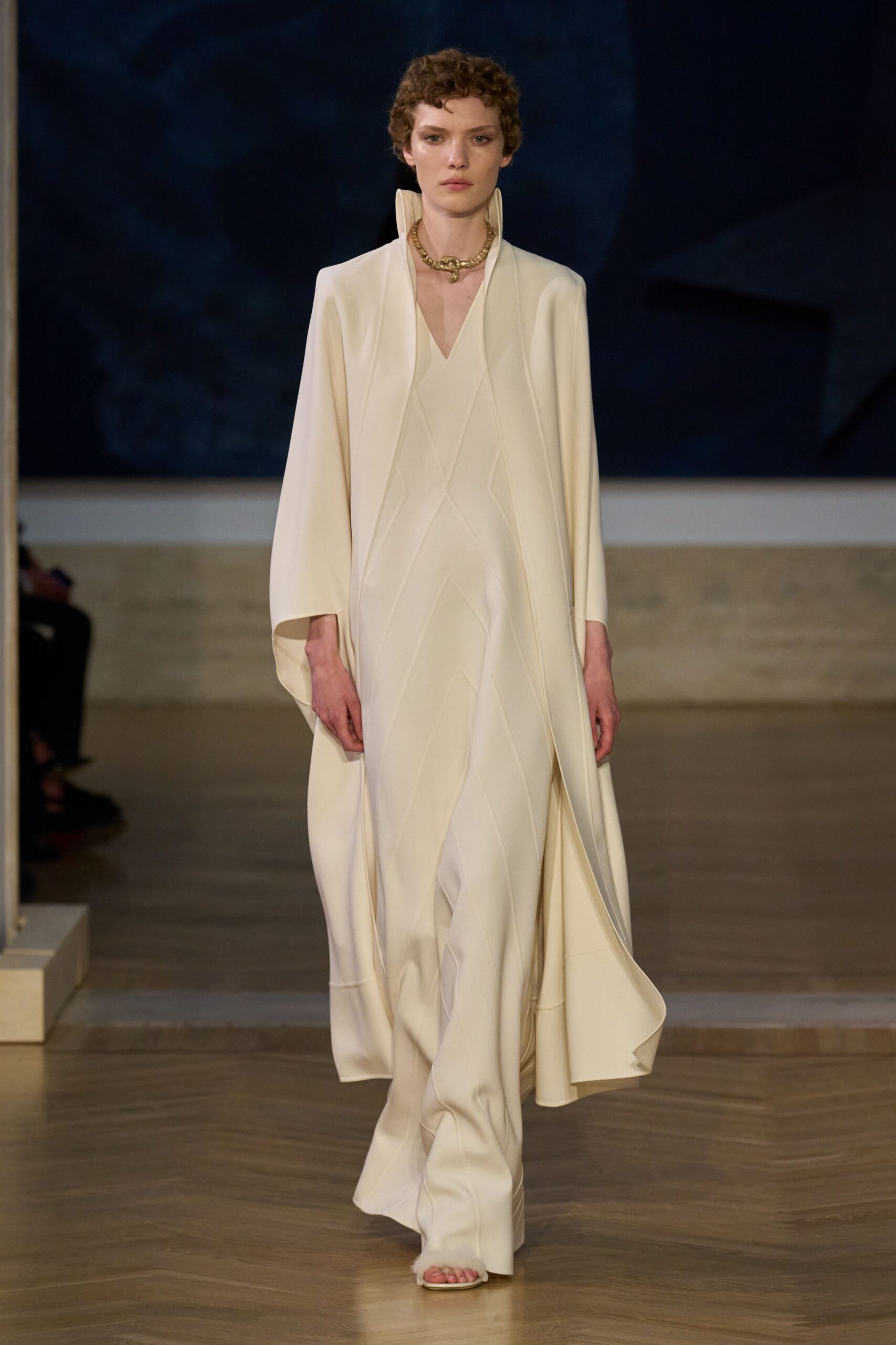 white wool long-sleeve v-neck fitted draped maxi gown