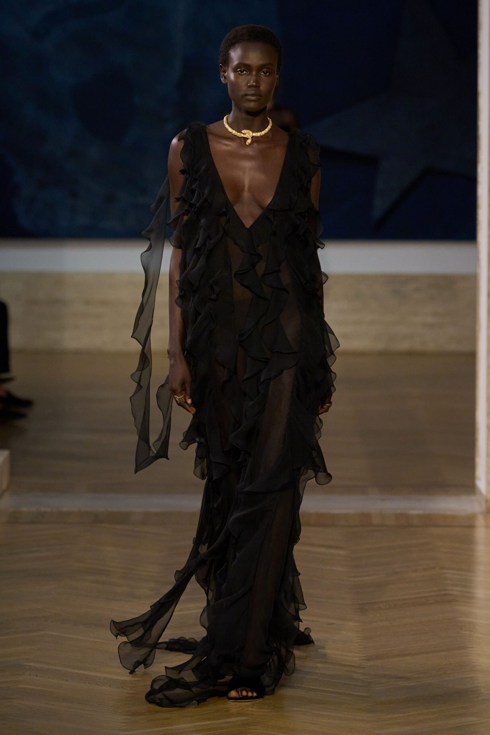black chiffon sleeveless v-neck fitted ruffled layered gown