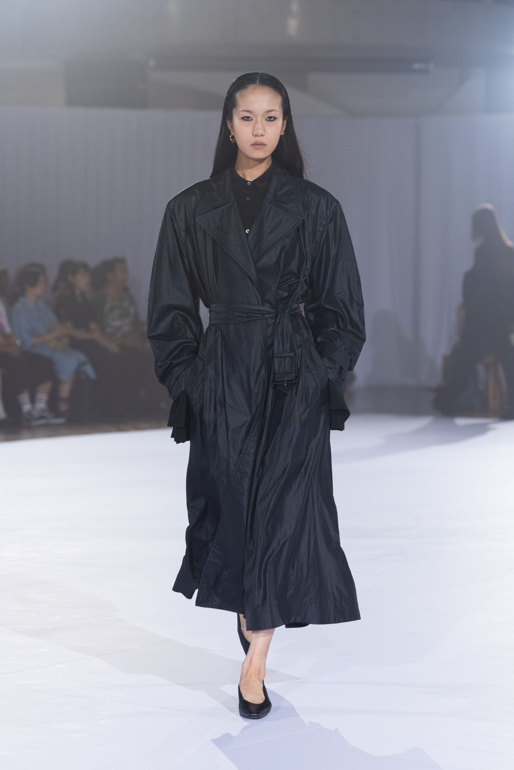 black cotton long-sleeve collared relaxed belted layered coat