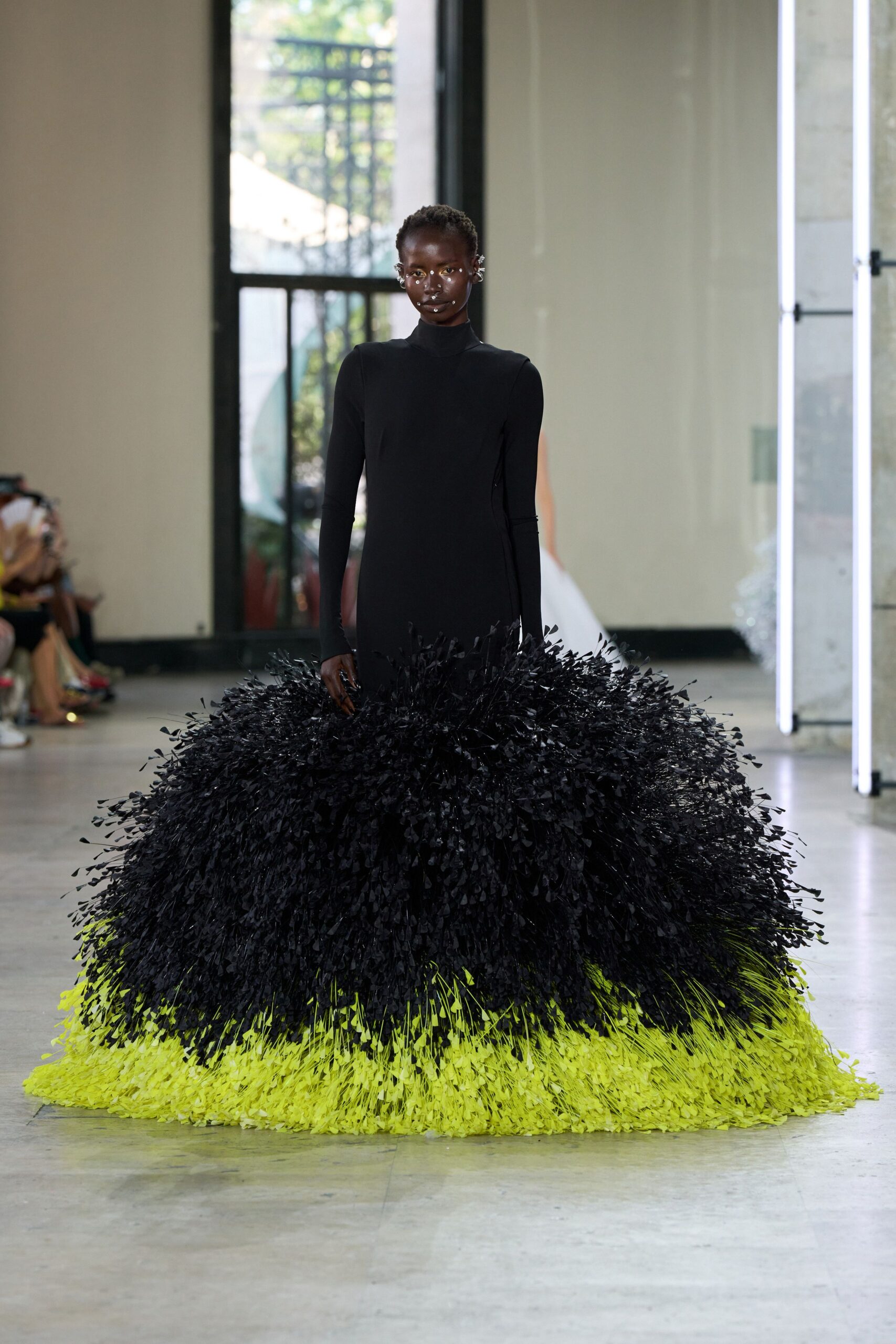 black and yellow tiered gown