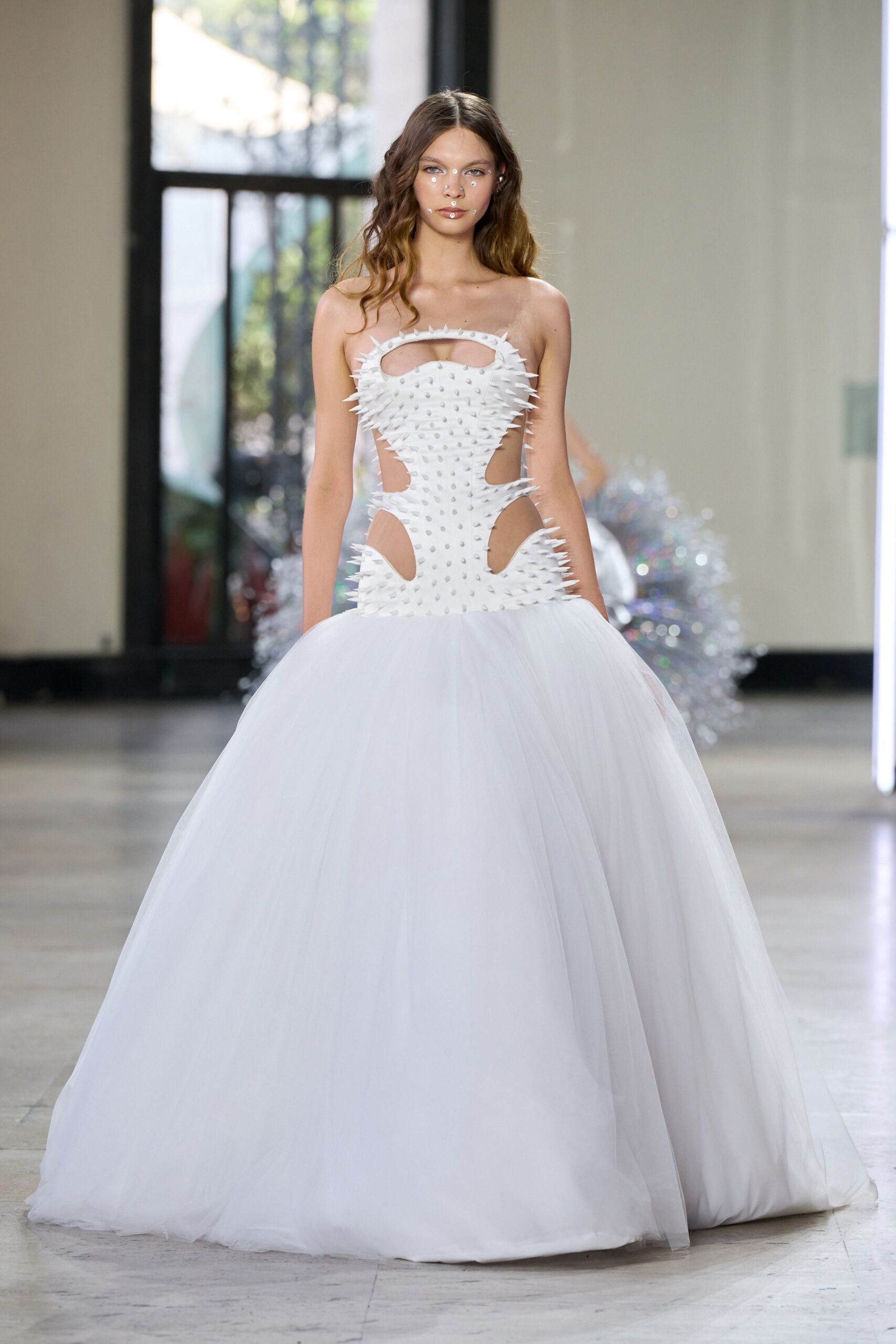 white sleeveless cutout gown
