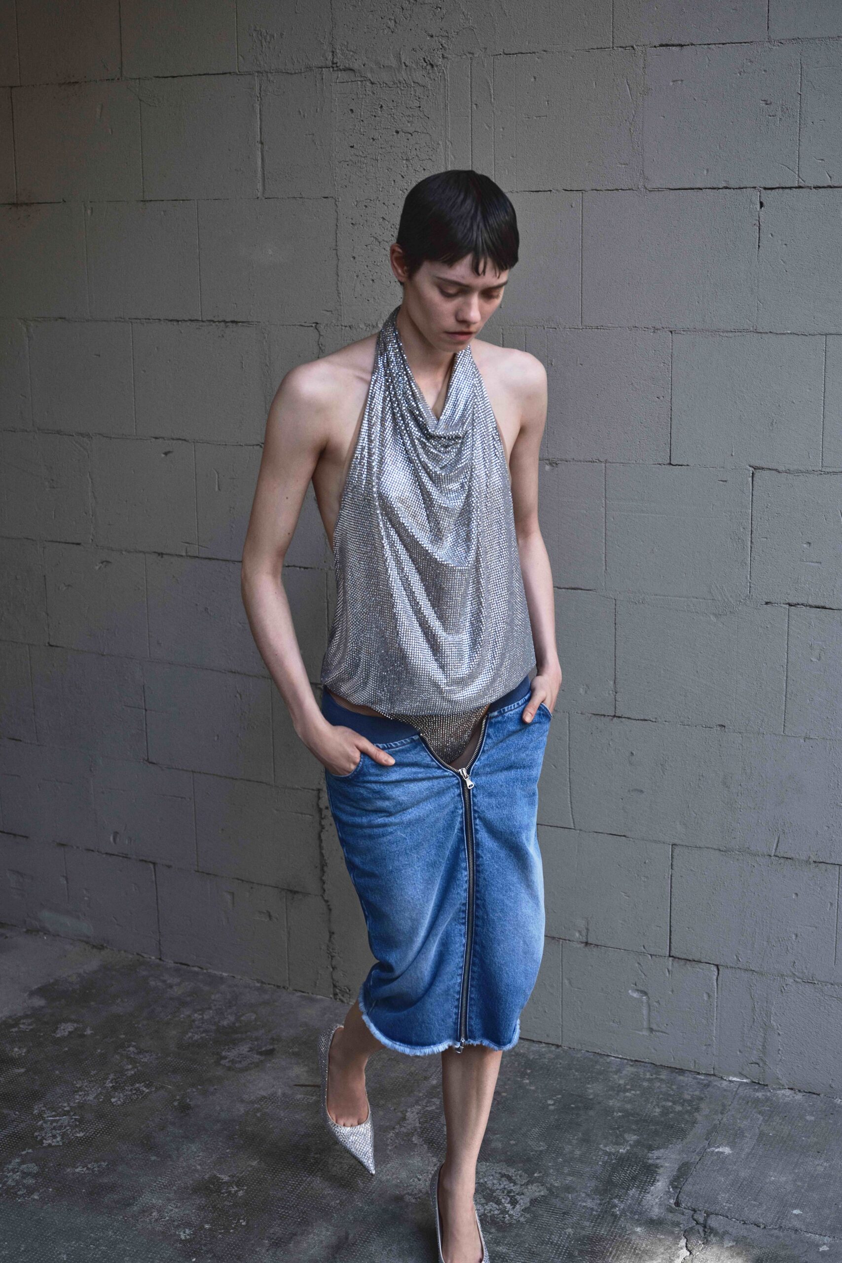 silver draped top with denim skirt