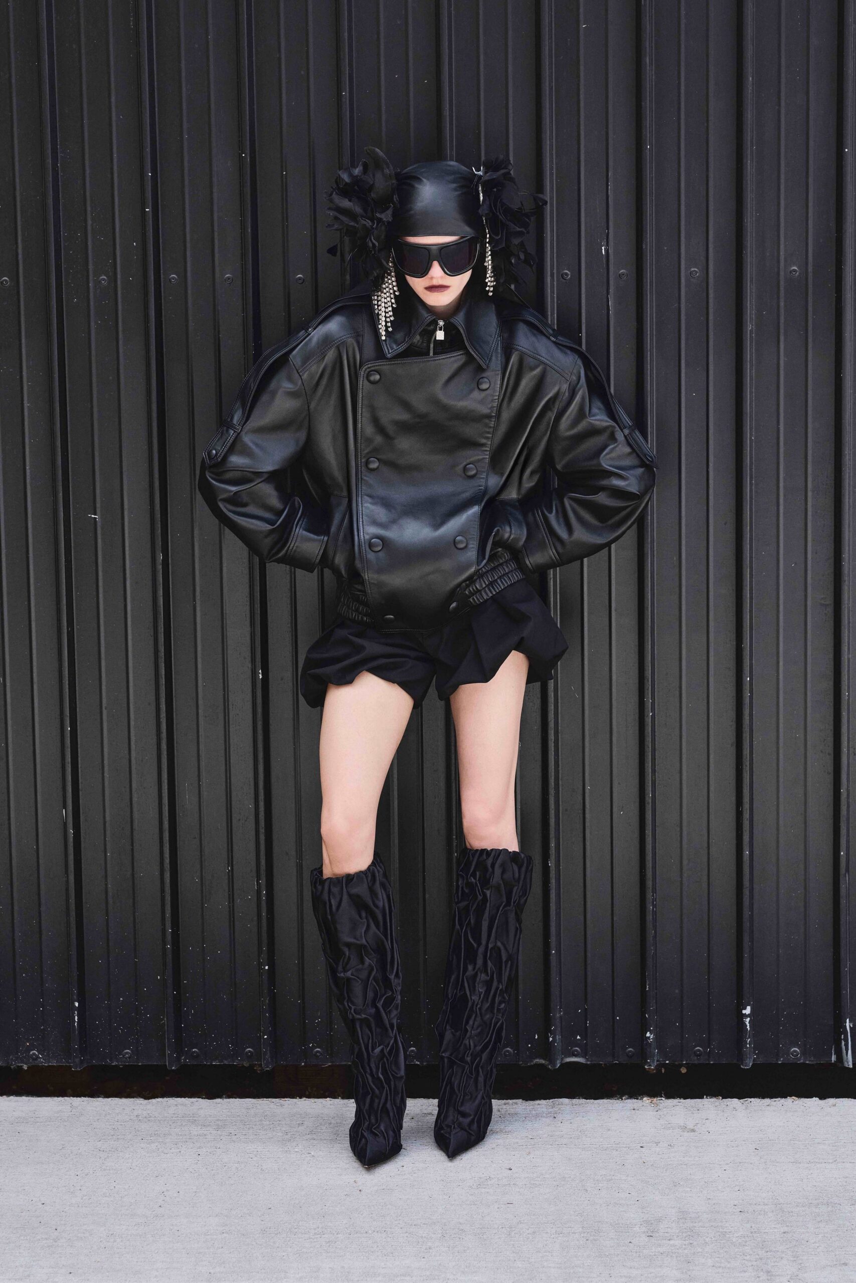 black leather jacket with ruffled shorts