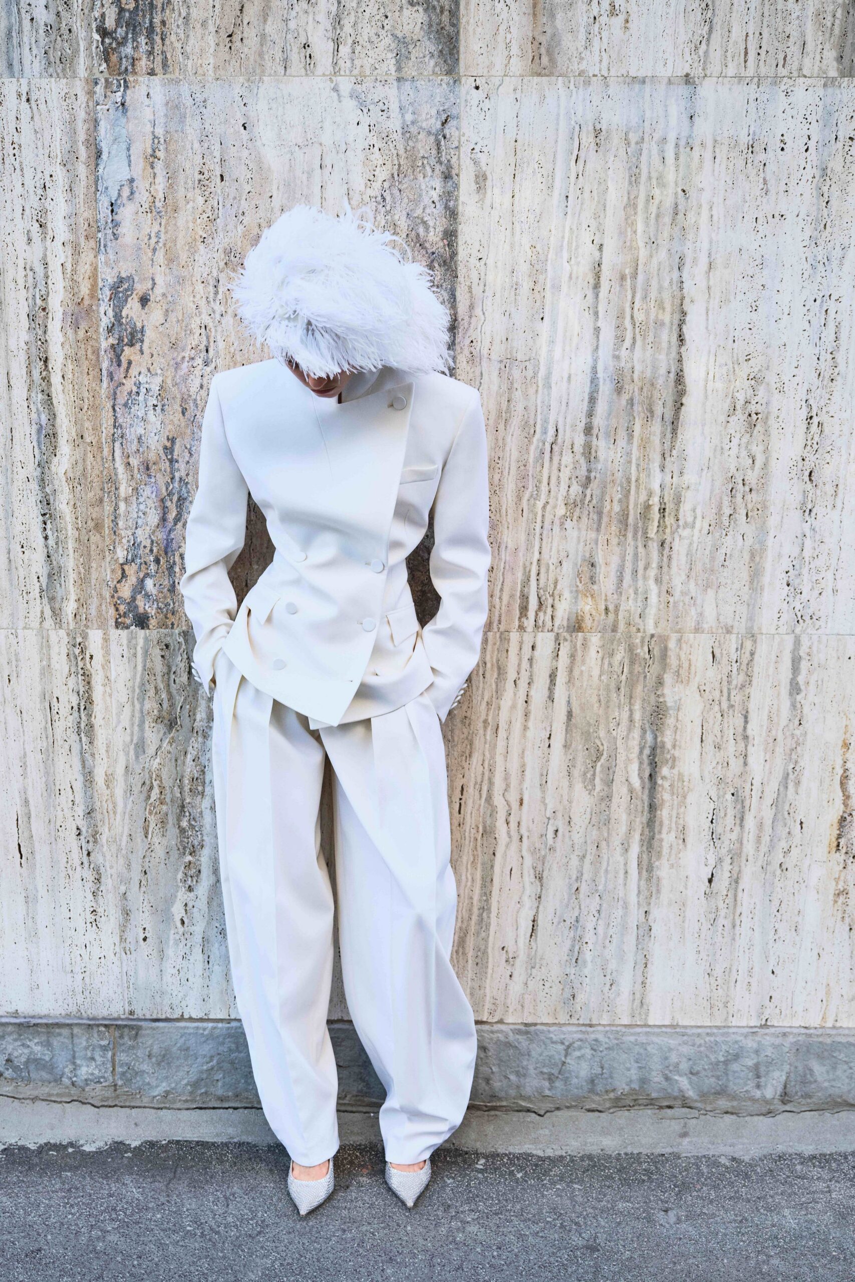 white structured blazer and relaxed pants