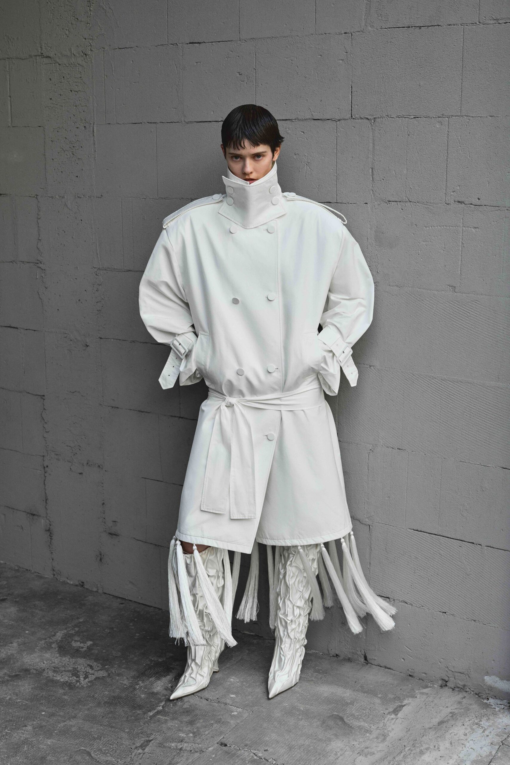 white oversized trench coat and boots