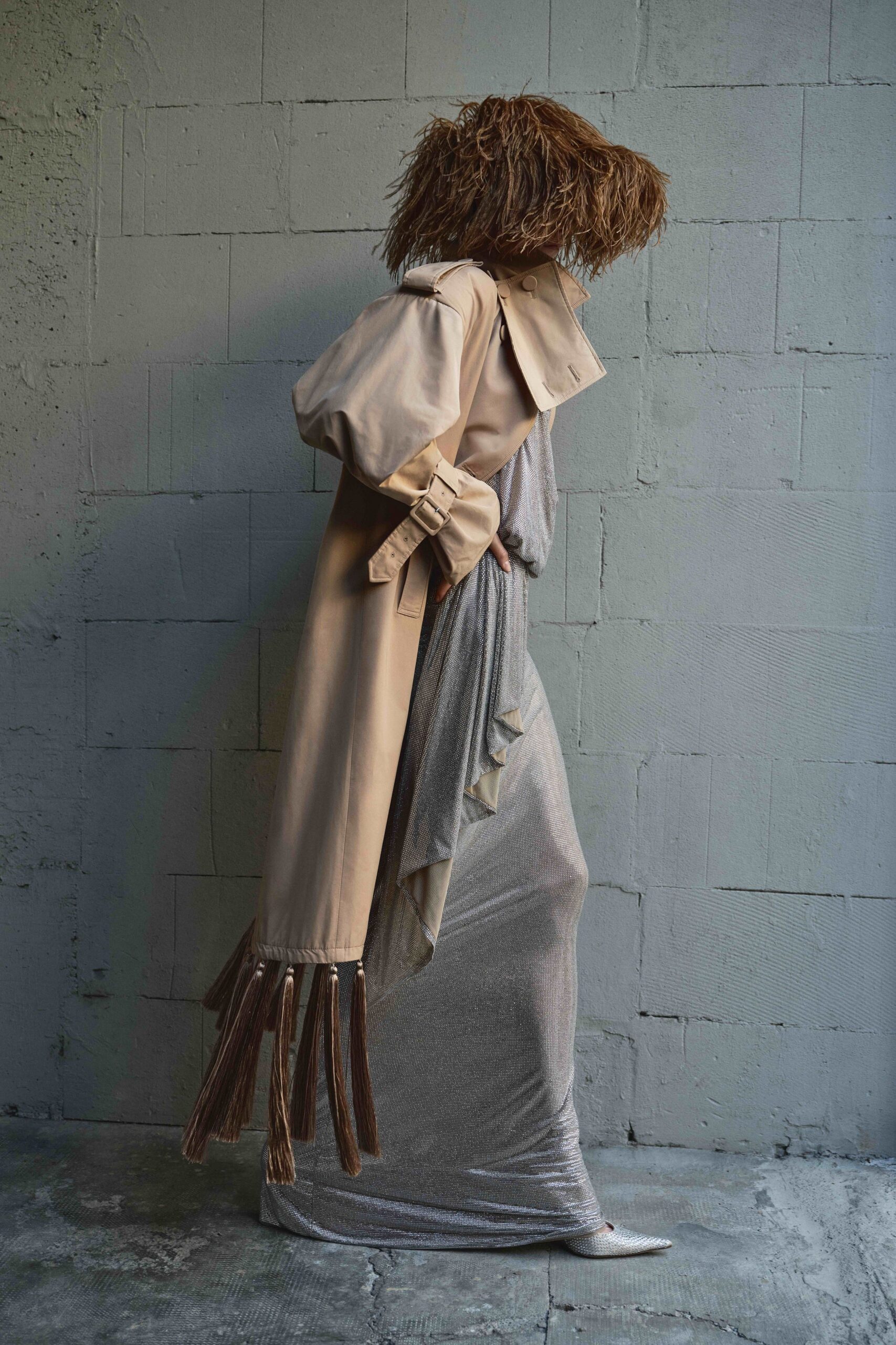 beige trench coat silver gown