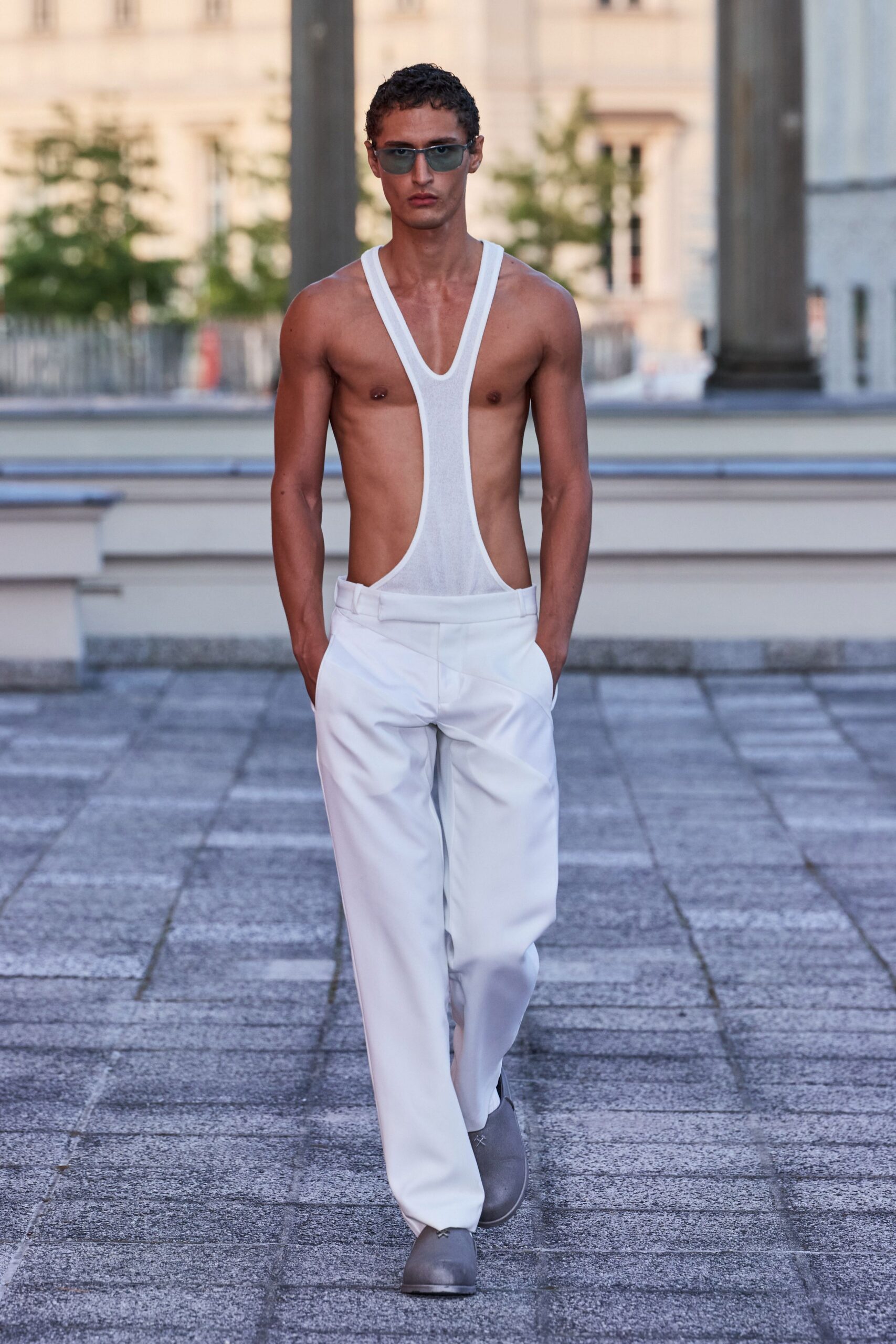 white cotton sleeveless v-neck fitted zippered bodysuit