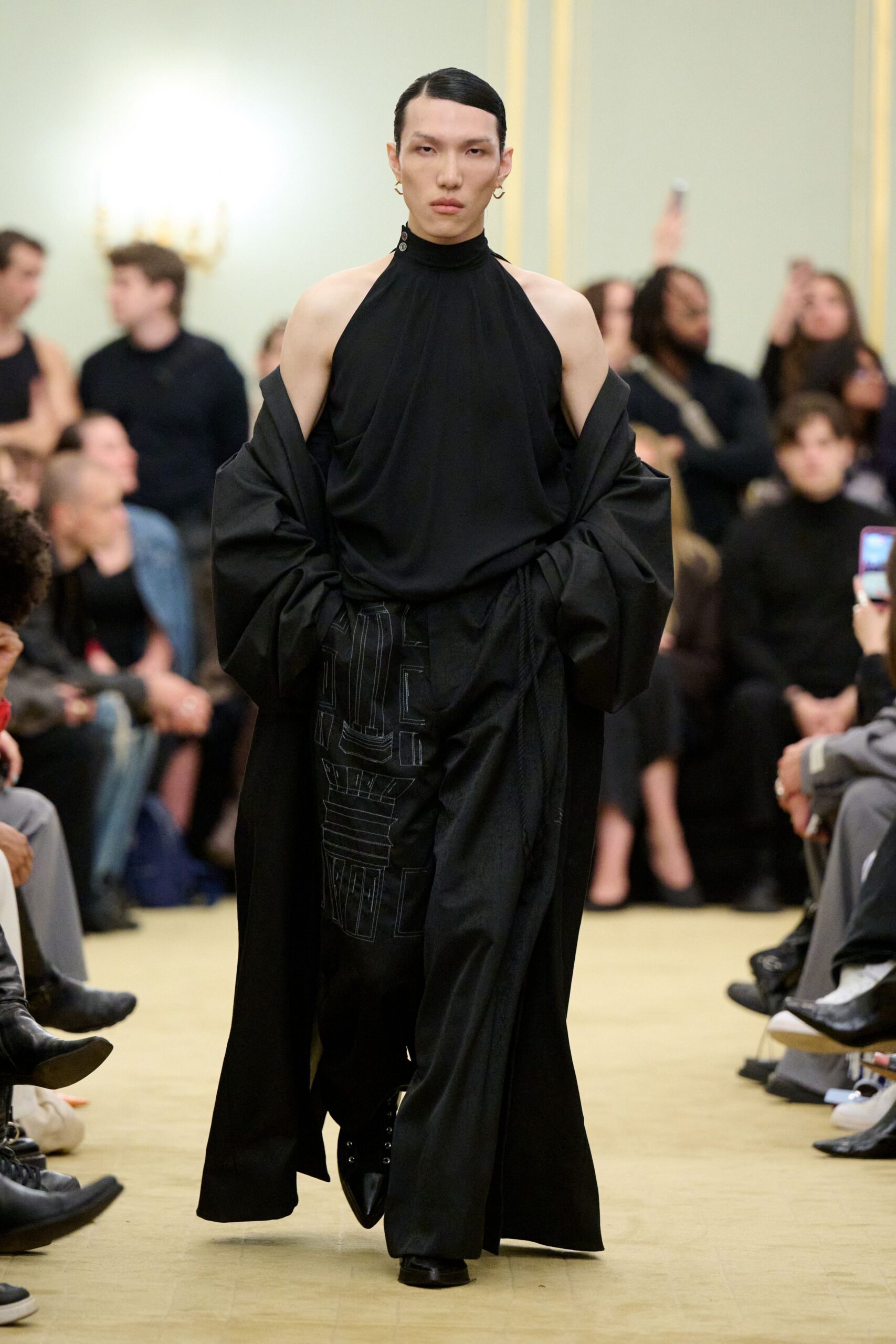 black silk sleeveless dress with oversized coat