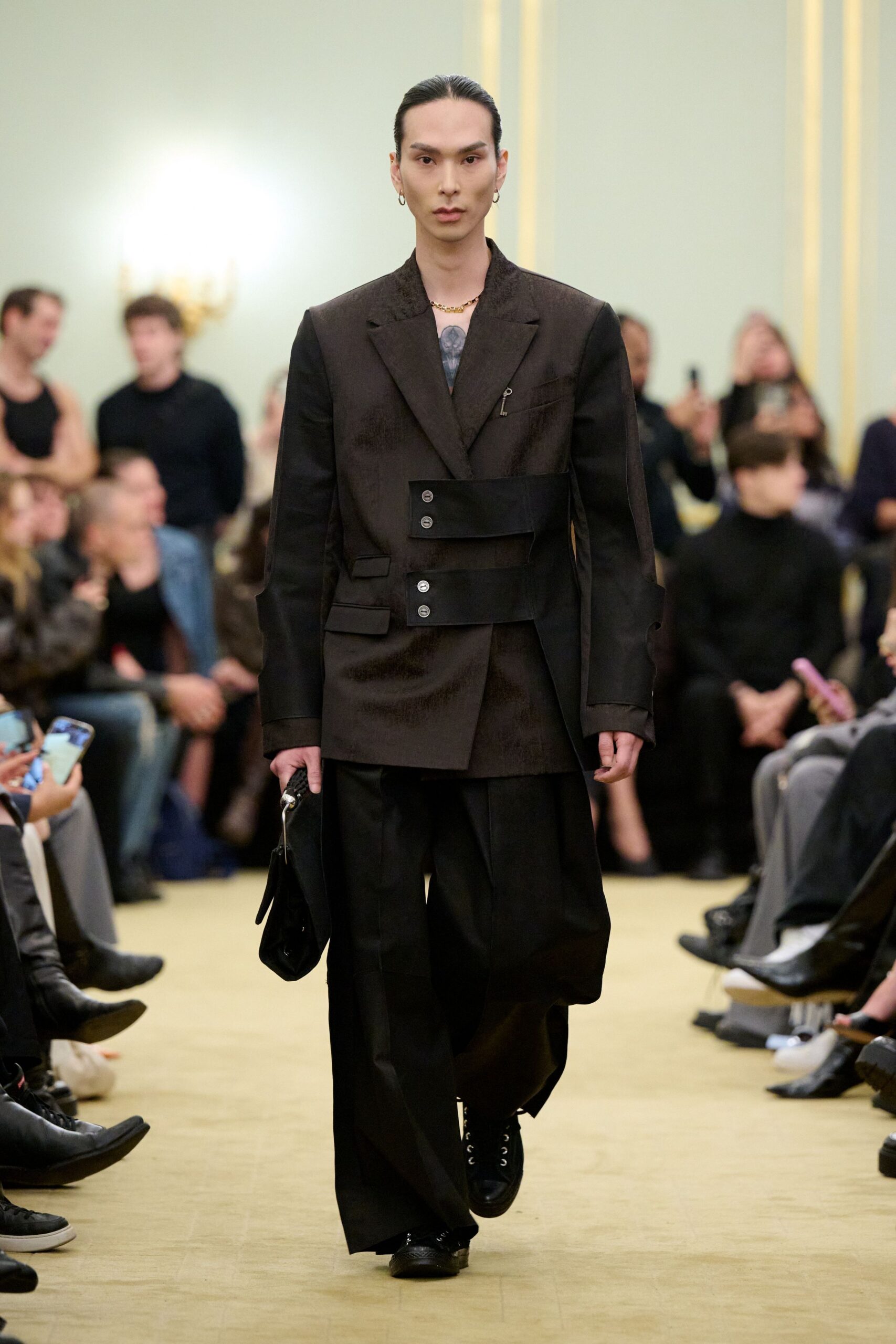 black structured blazer and relaxed pants