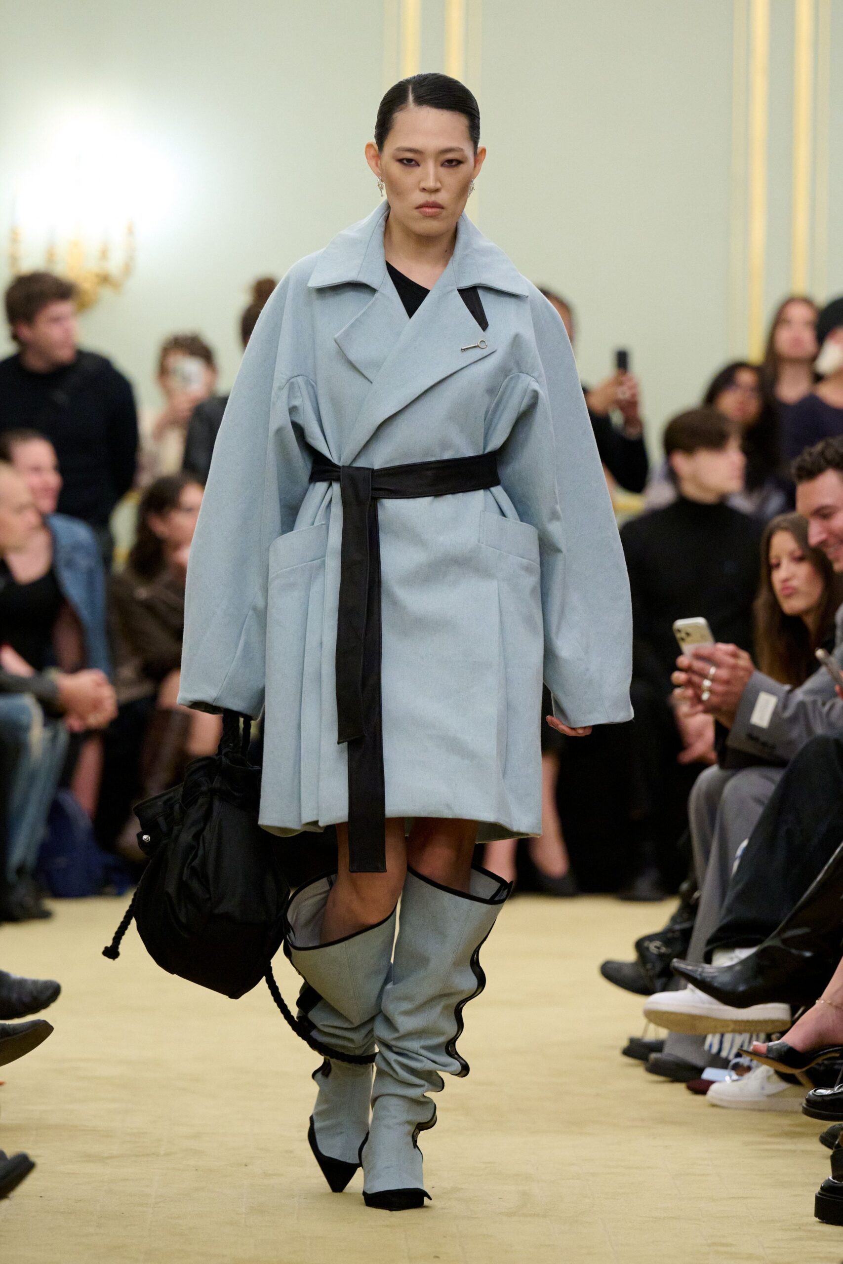 light blue oversized coat with gray boots