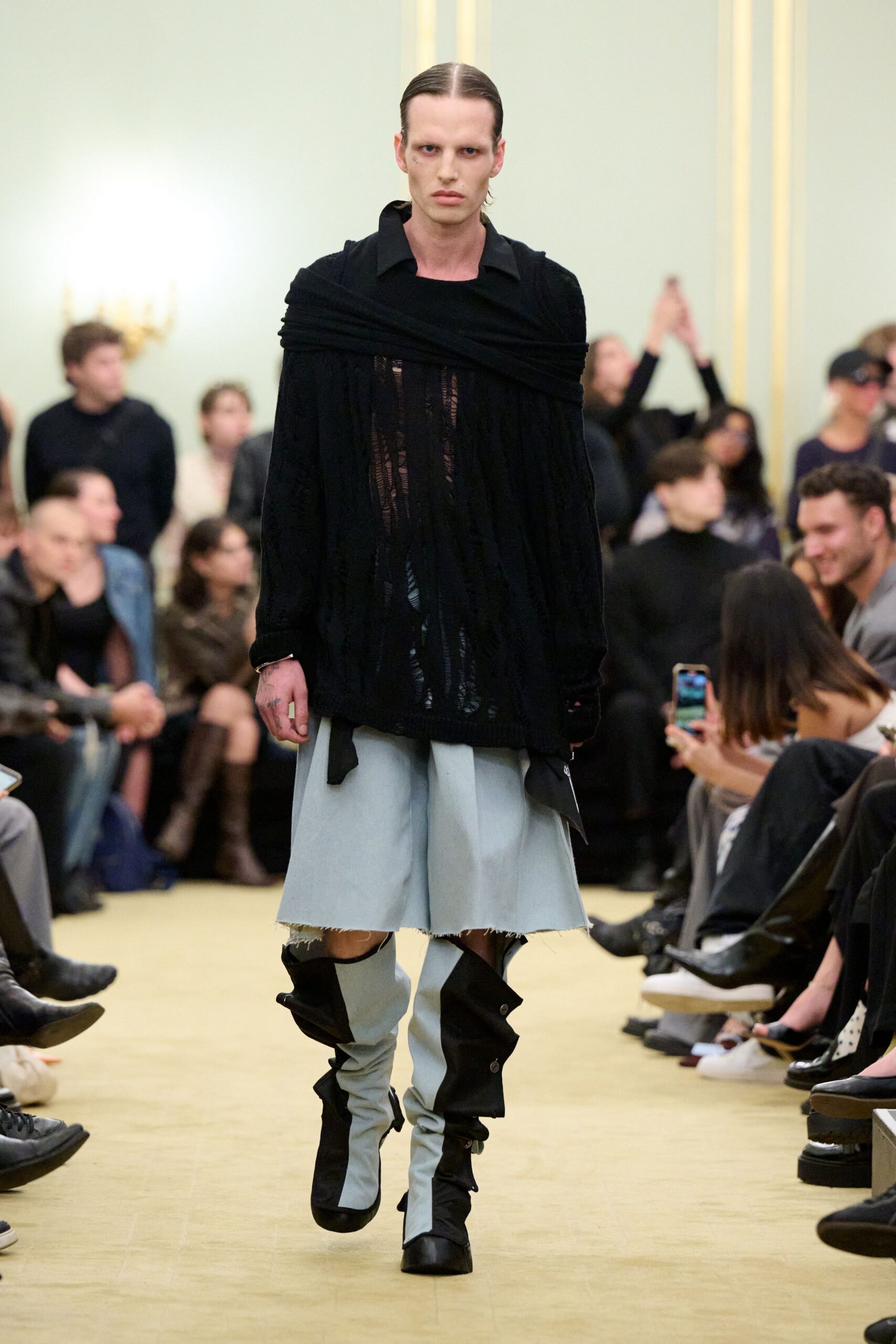 black shirt blue skirt boots