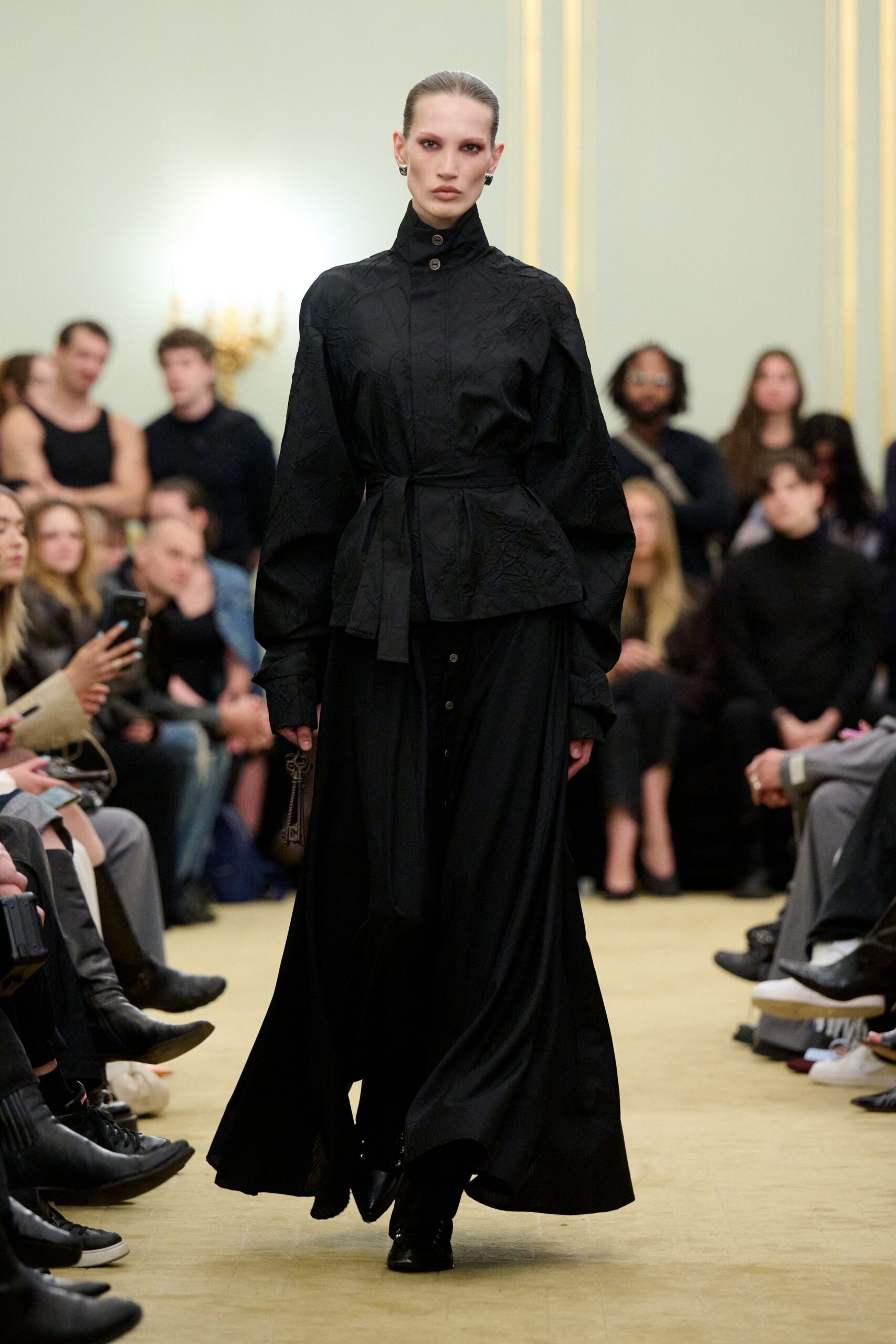 black coat and dress with boots