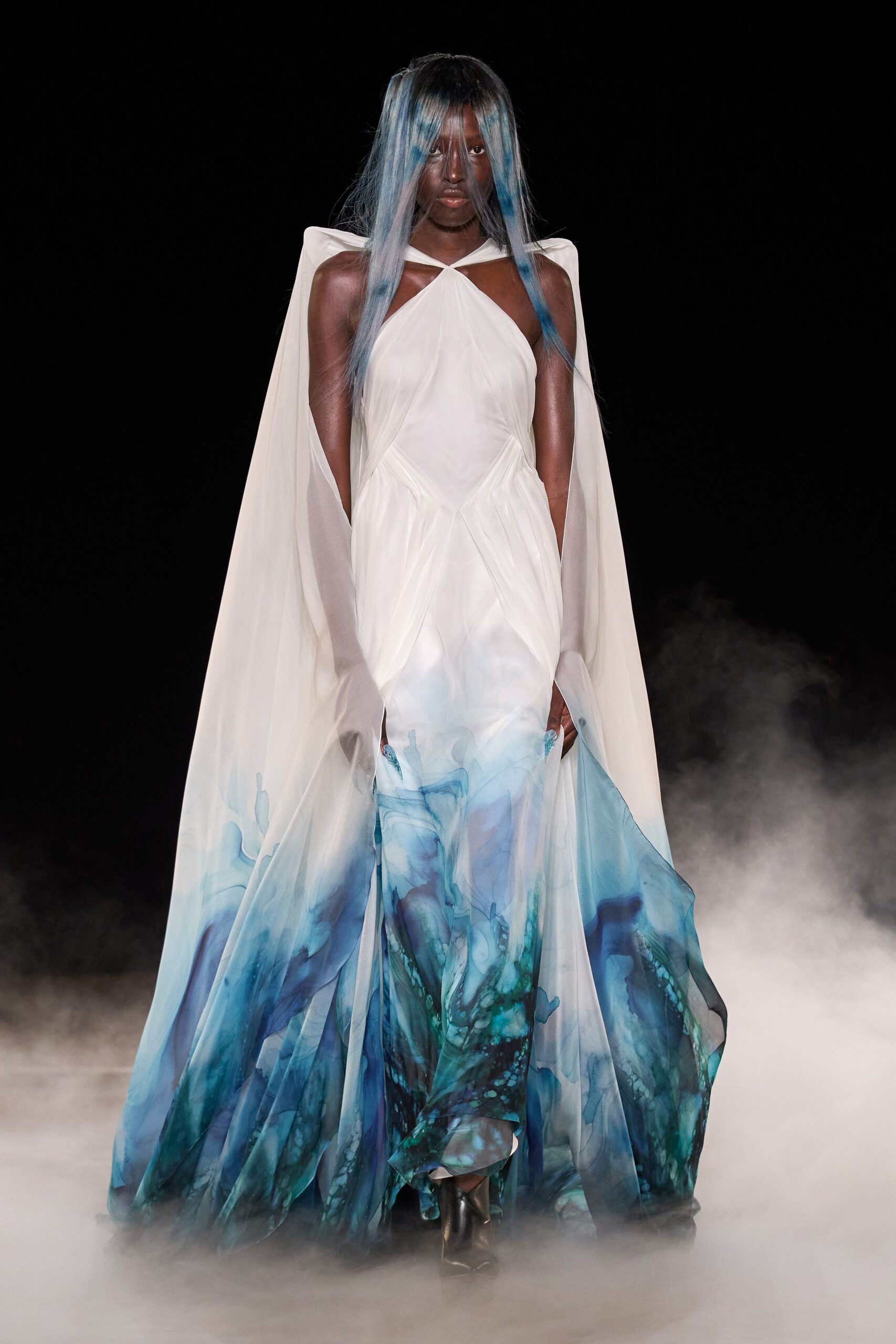 white silk flowing gown with cape