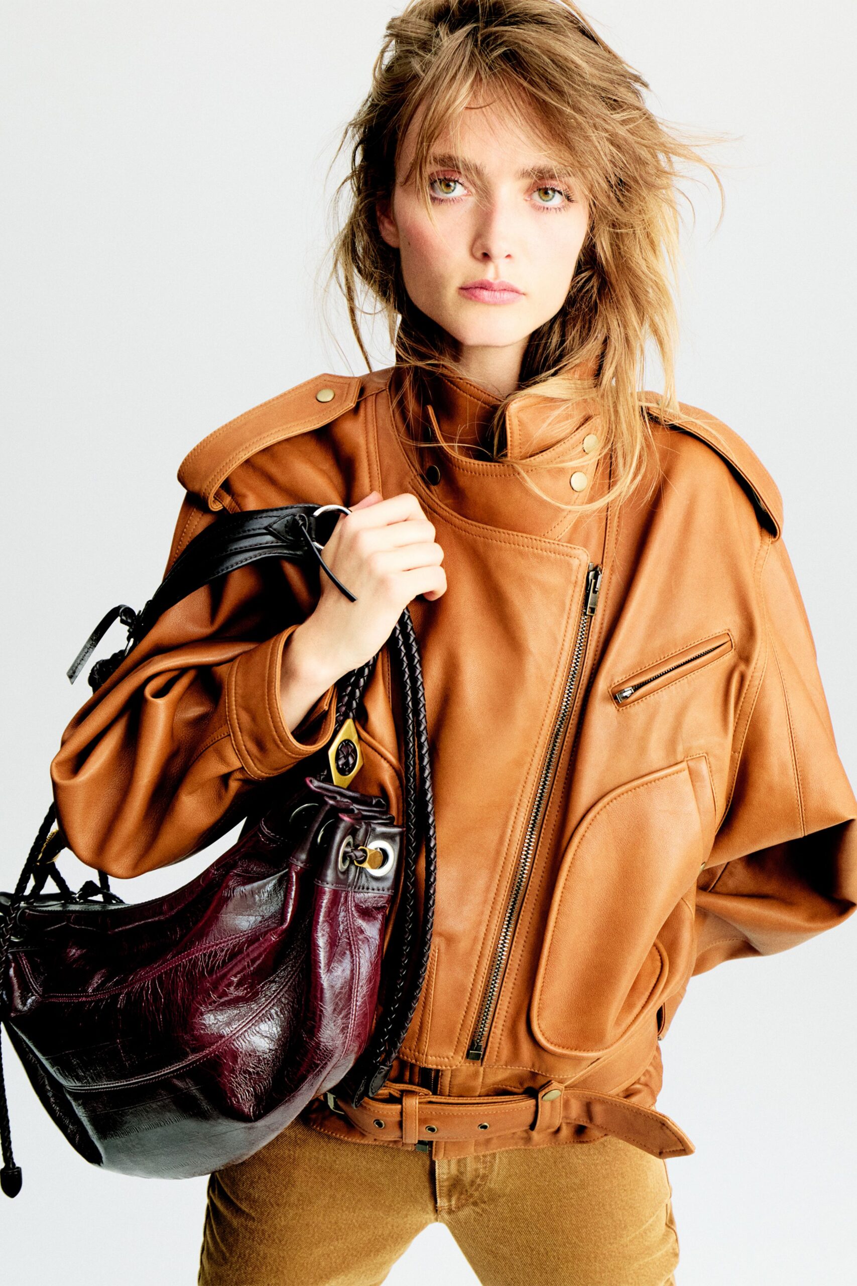 brown leather long-sleeve collared oversized zippered pockets jacket