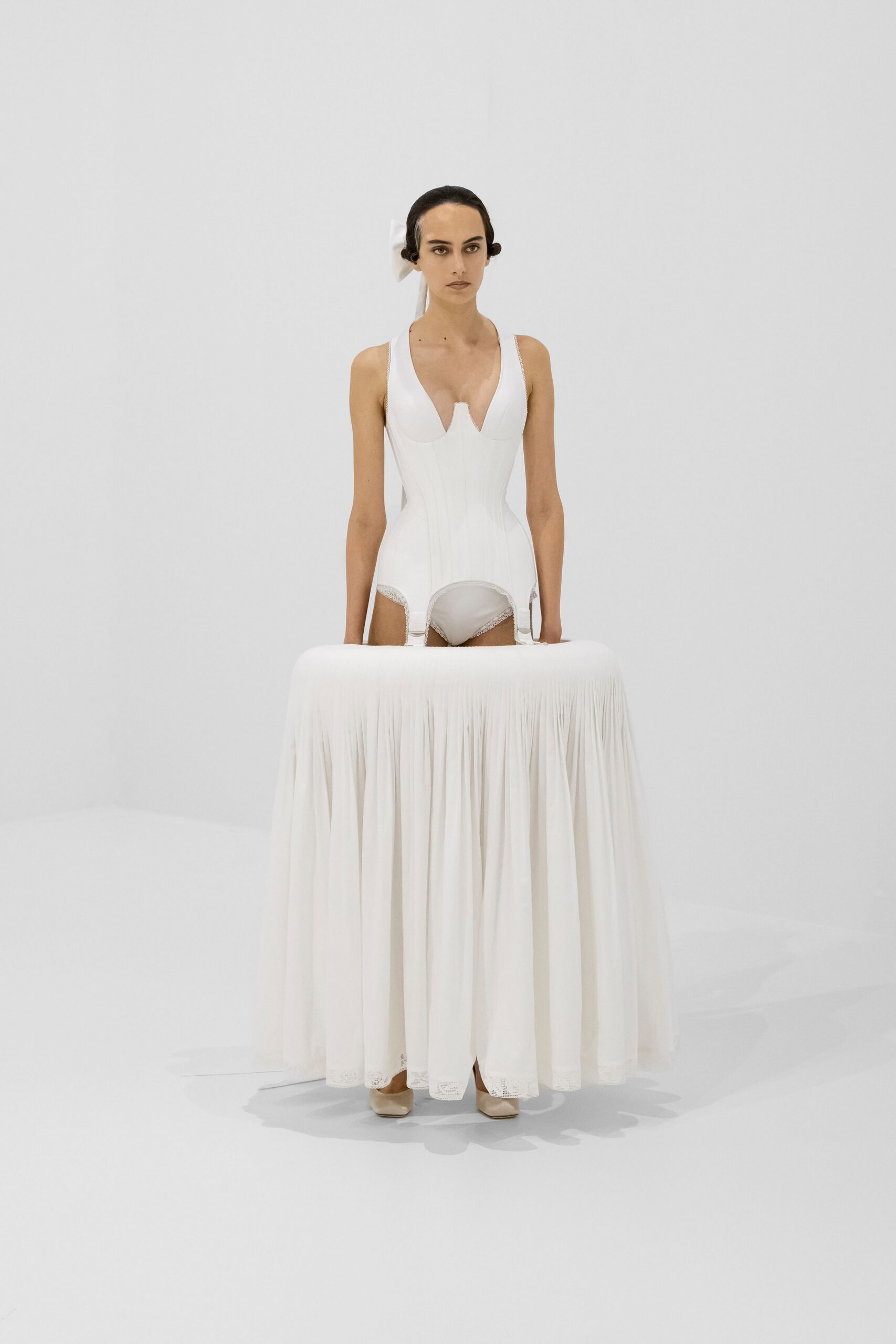 white silk sleeveless v-neck fitted pleated maxi gown