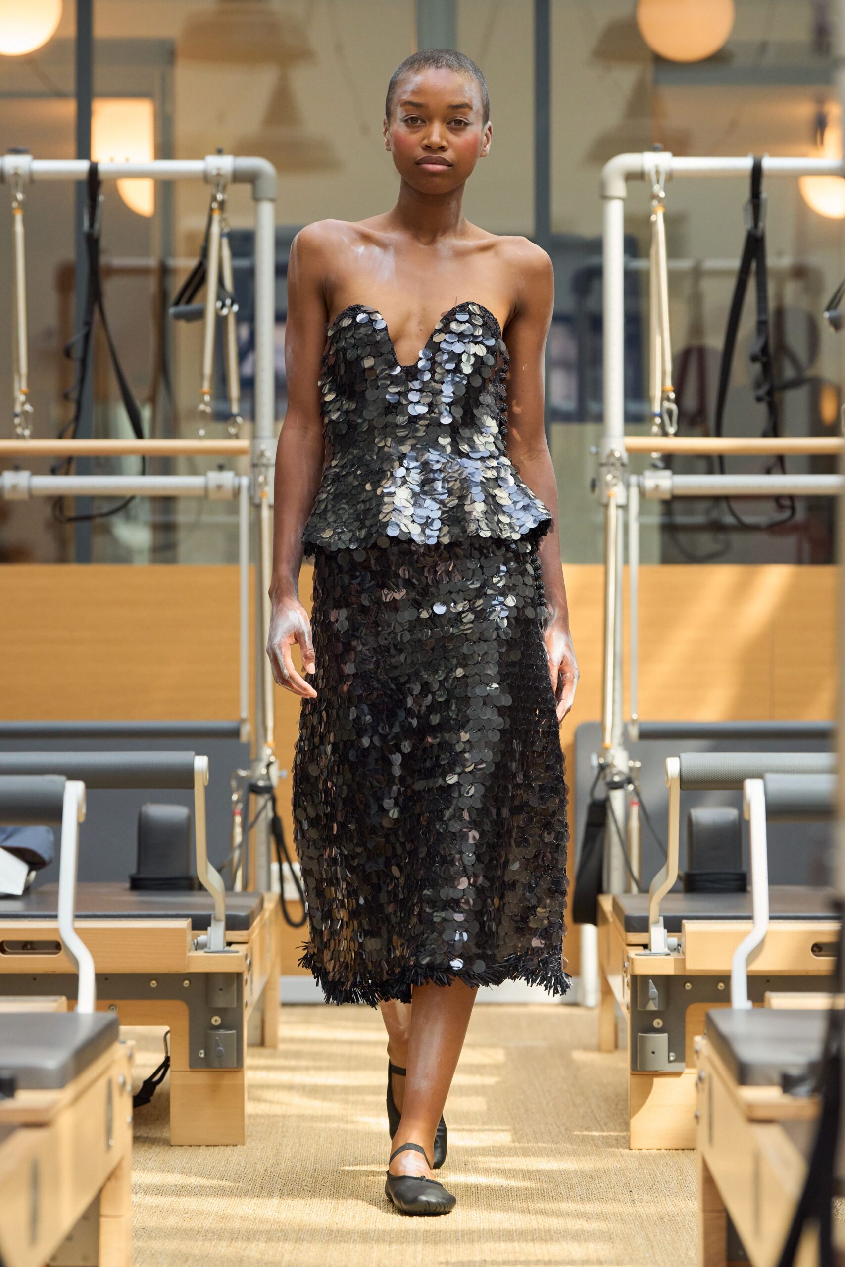 black sequin strapless v-neck fitted pleated shiny dress