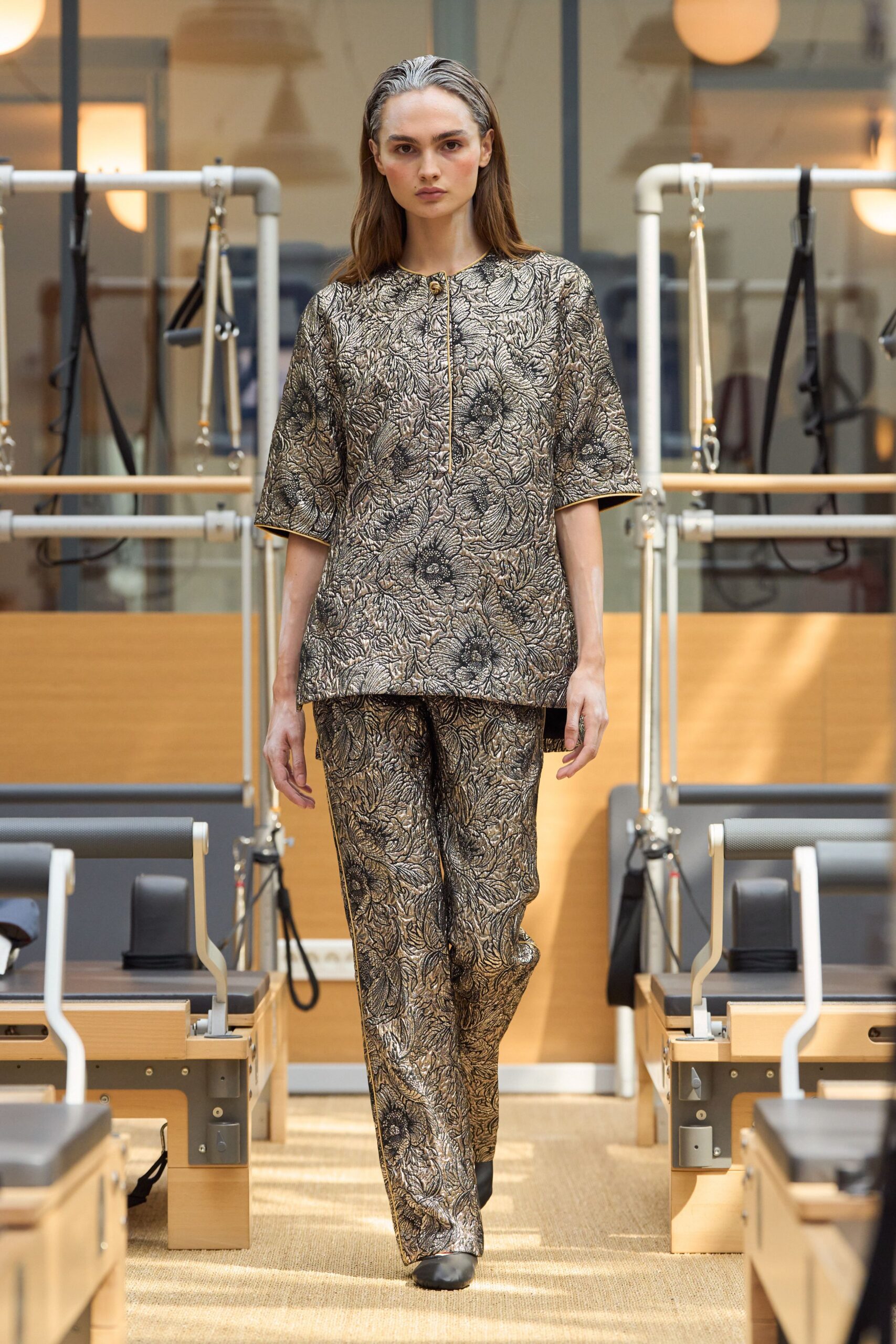 gold and black printed top and pants