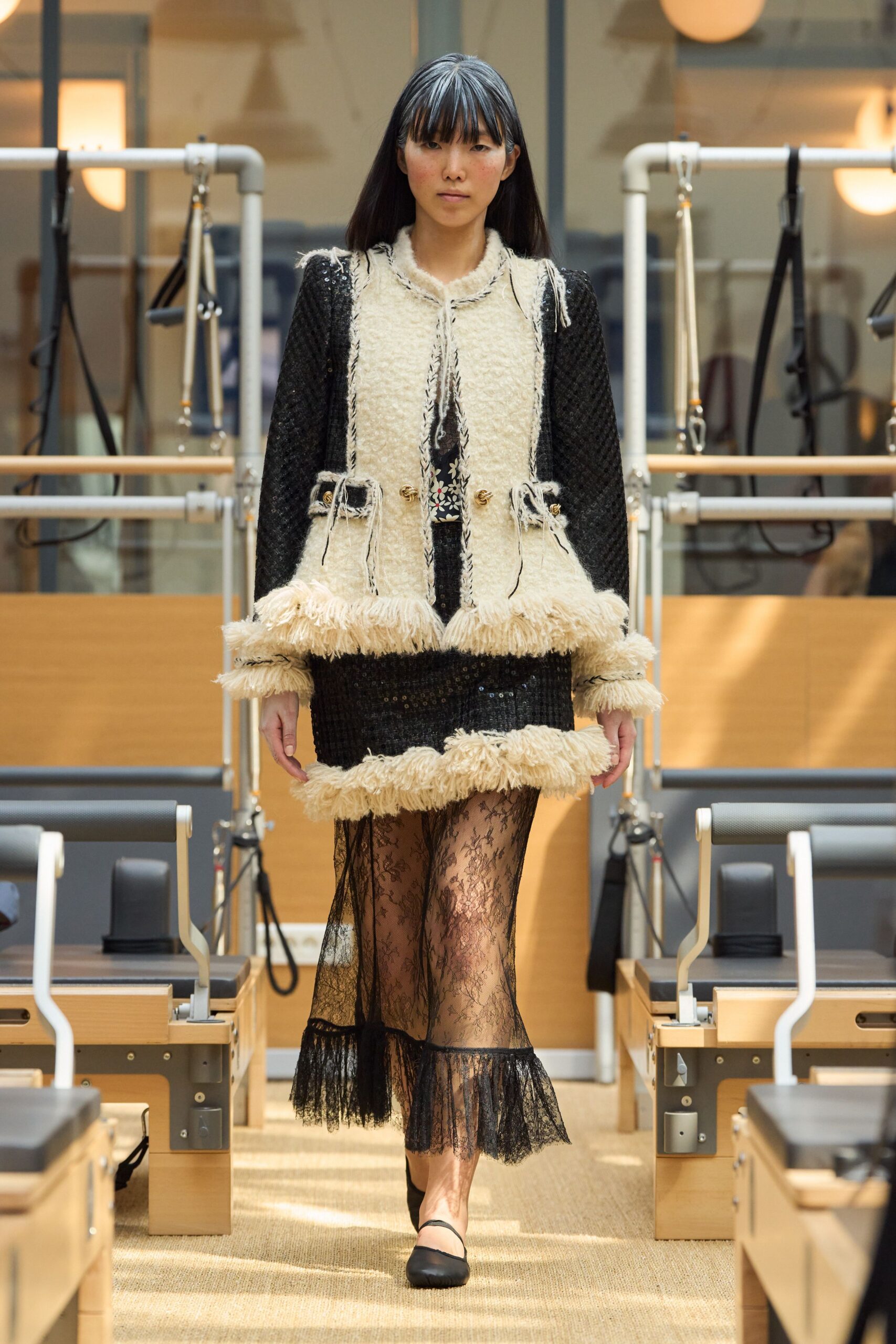 black and beige fringed jacket with lace skirt