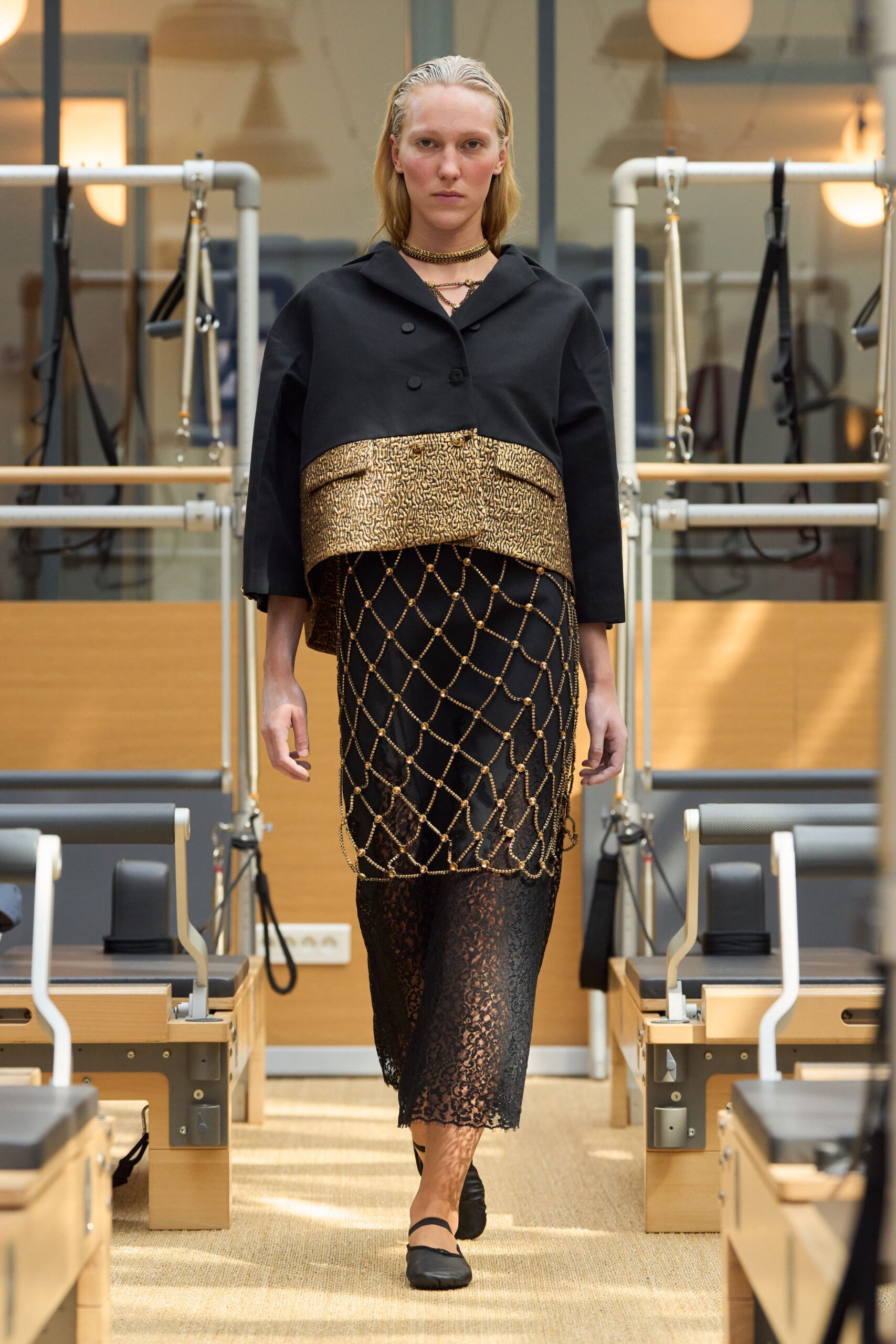 black relaxed jacket and lace dress