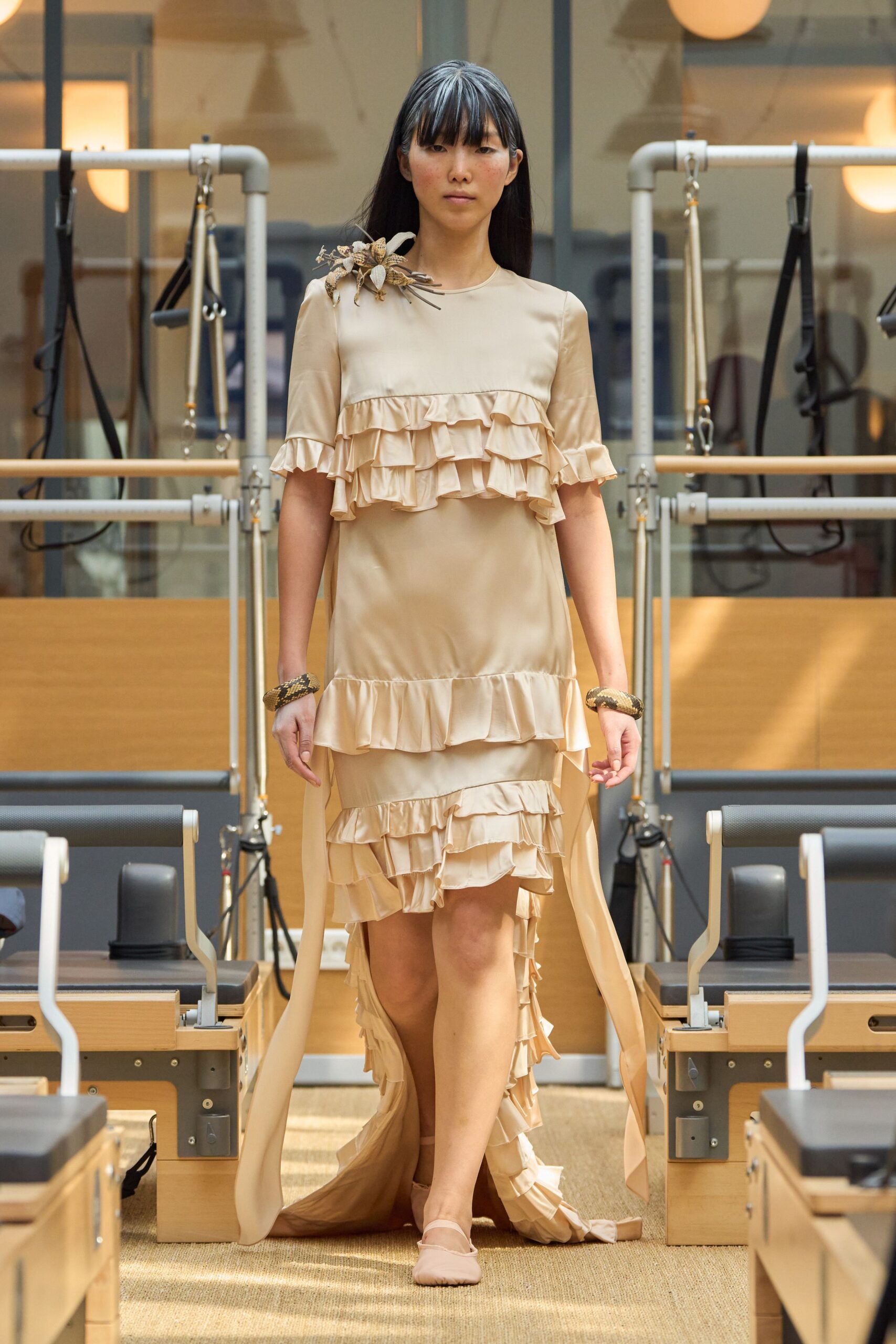 beige ruffled midi dress with shoes