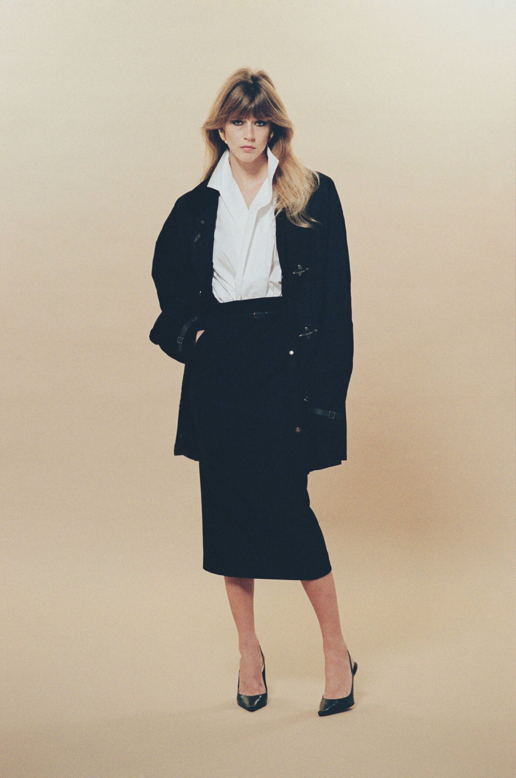 black cotton long-sleeve collared oversized buttoned coat