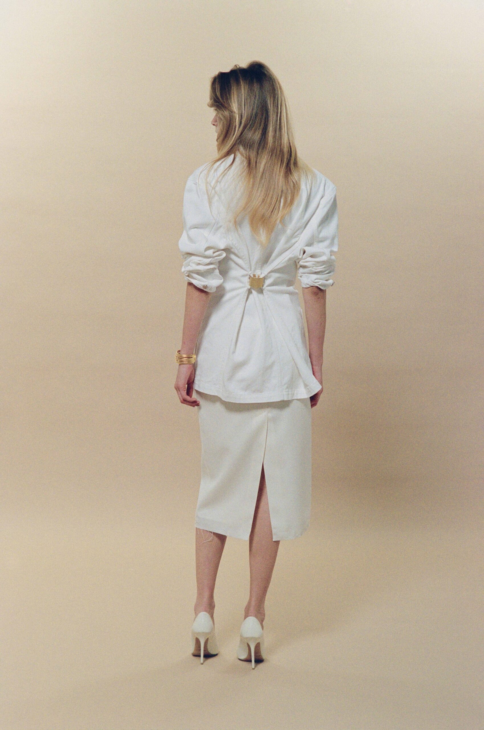 white cotton long-sleeve collared structured buttoned blazer