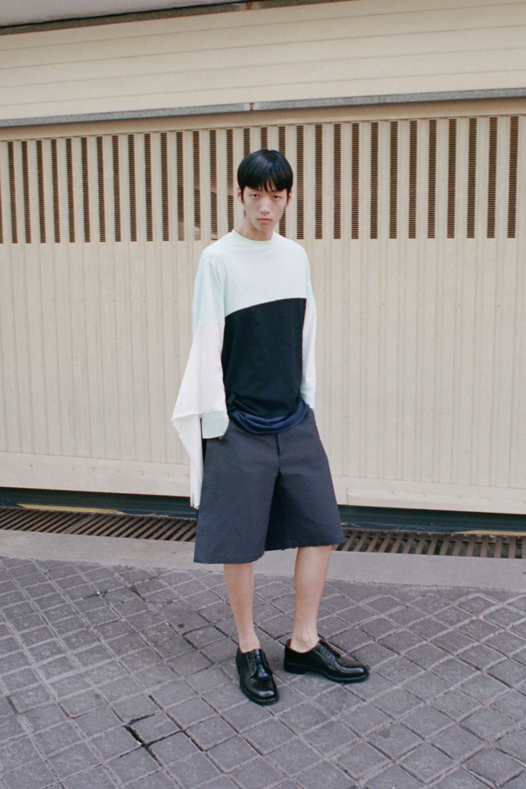 white cotton long-sleeve high-neck relaxed color-blocked top