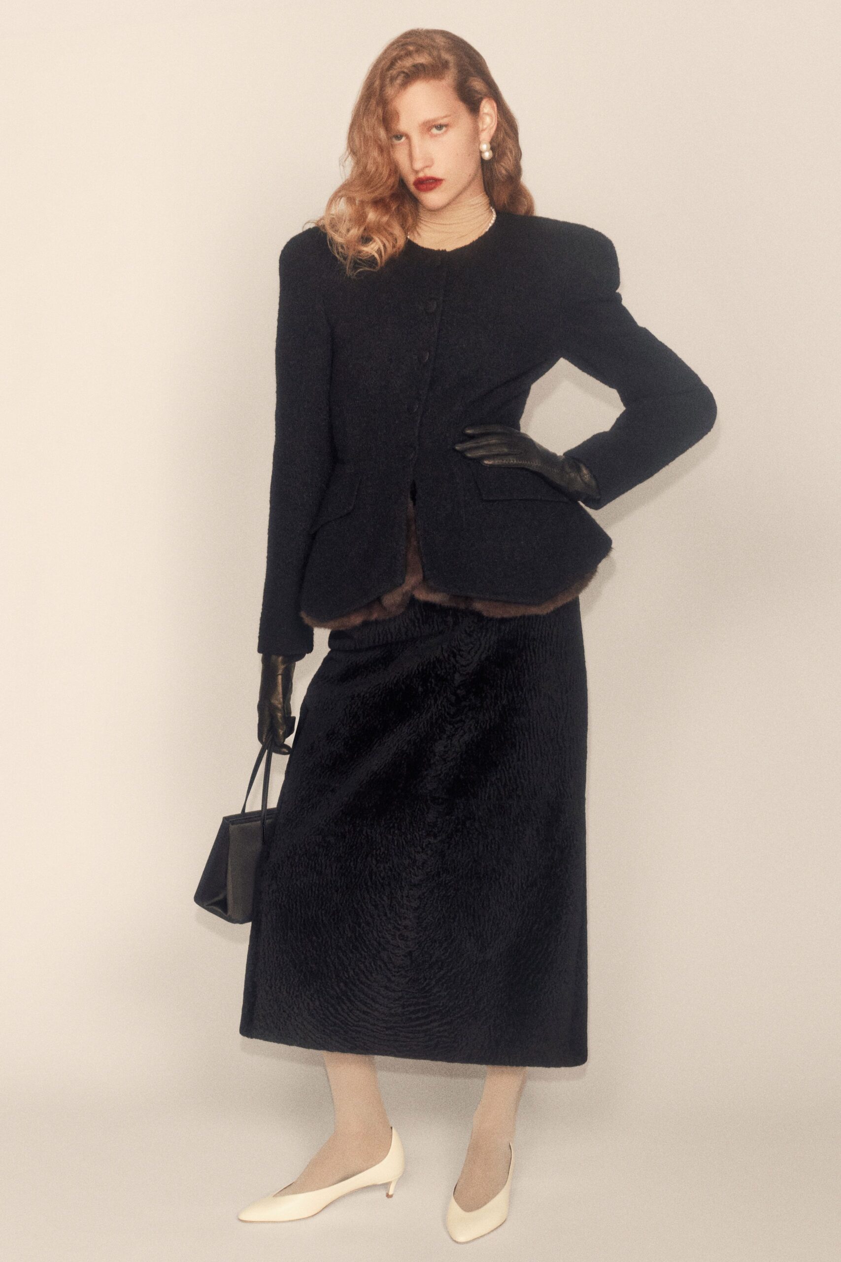 black wool long-sleeve collared structured buttoned jacket