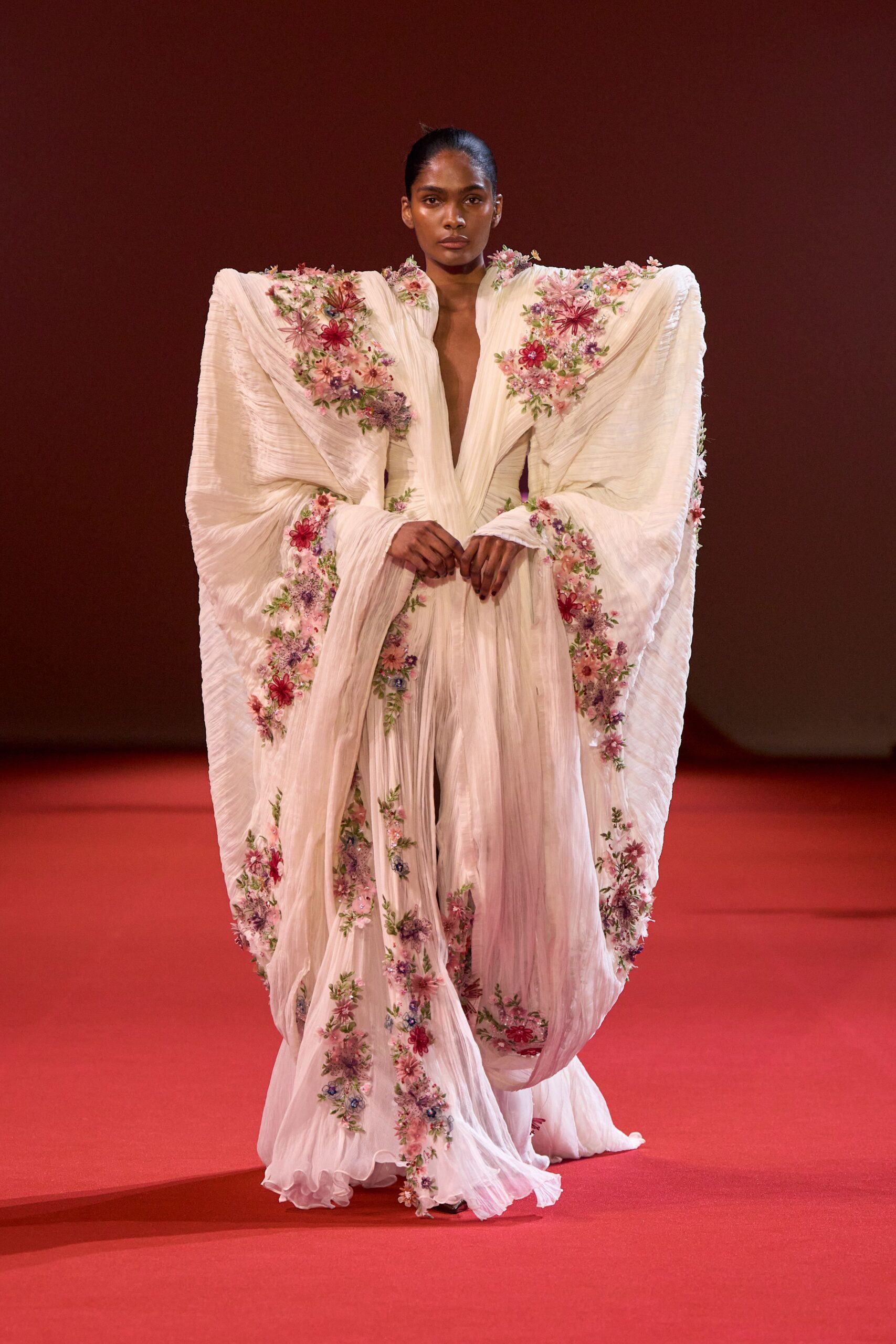 white embroidered flowing gown