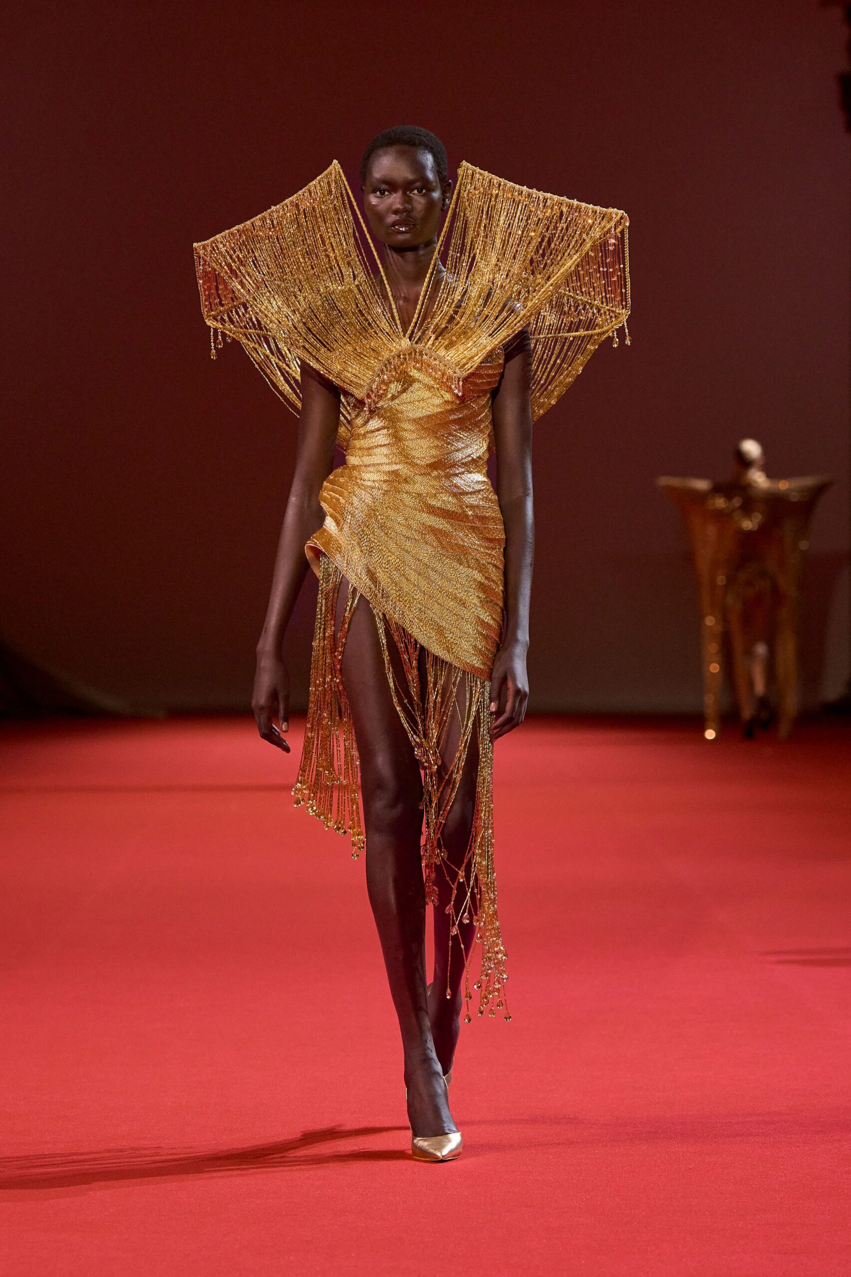 gold silk sleeveless v-neck fitted fringed draped dress