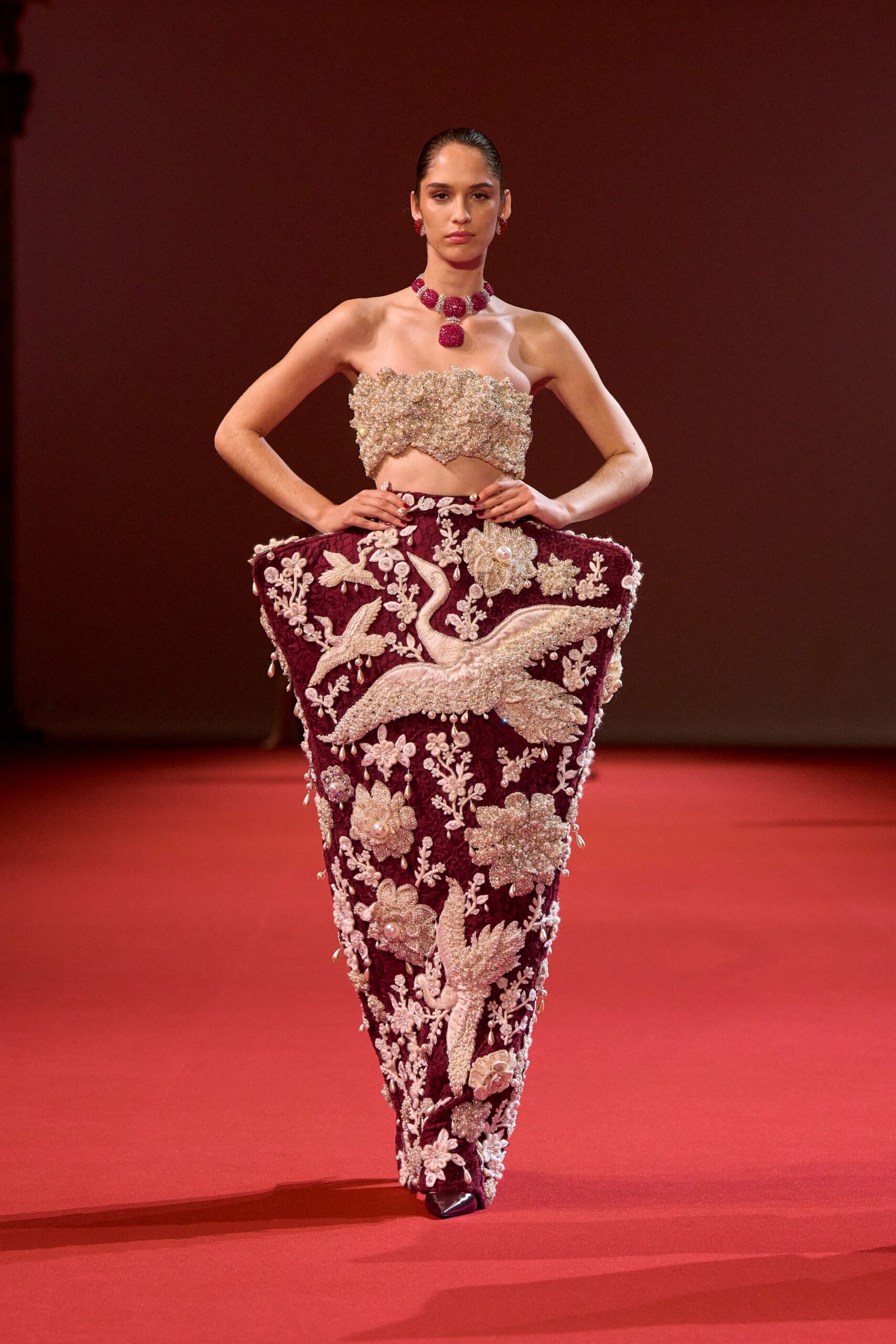 red embroidered strapless gown