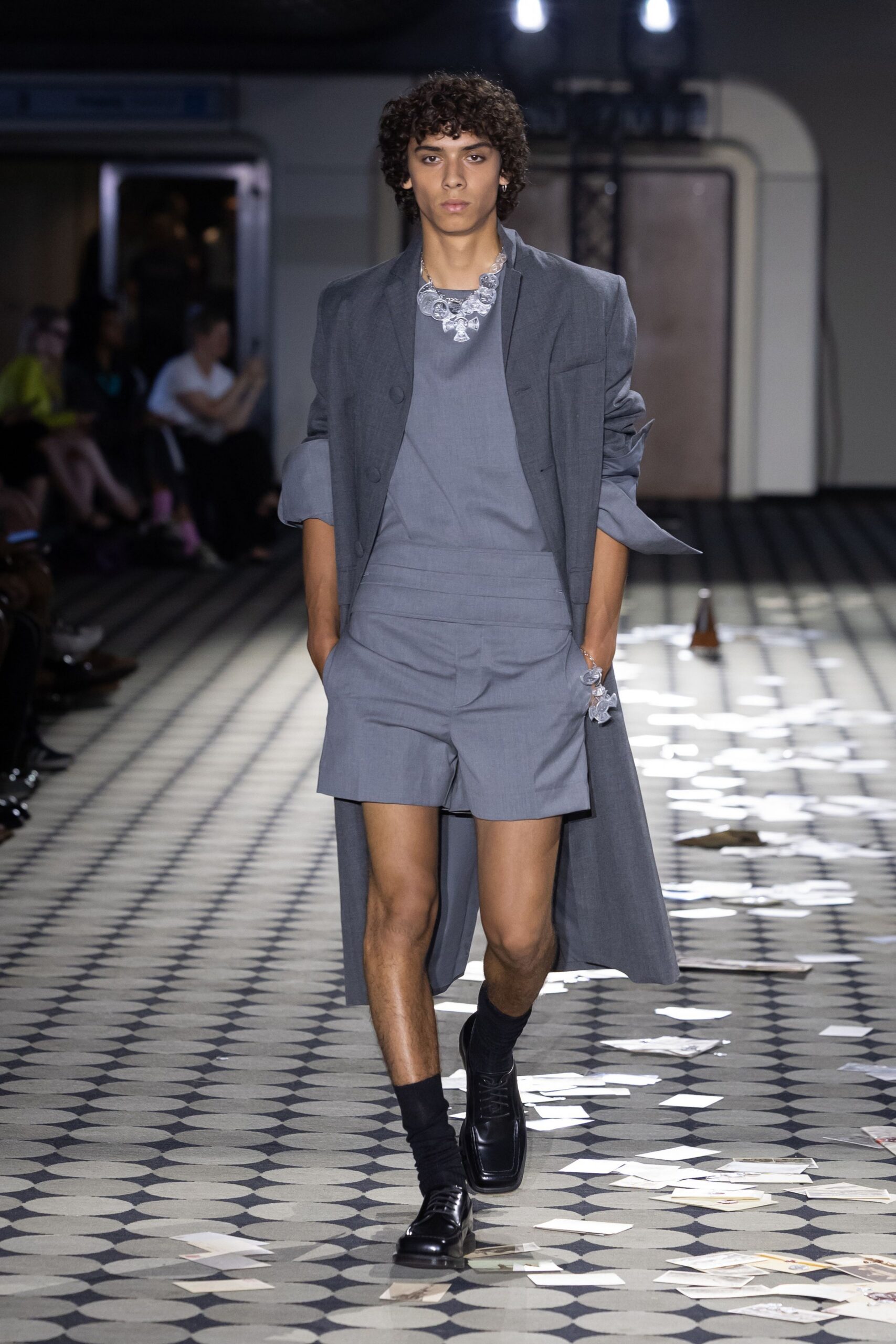 gray coat with fitted top and shorts