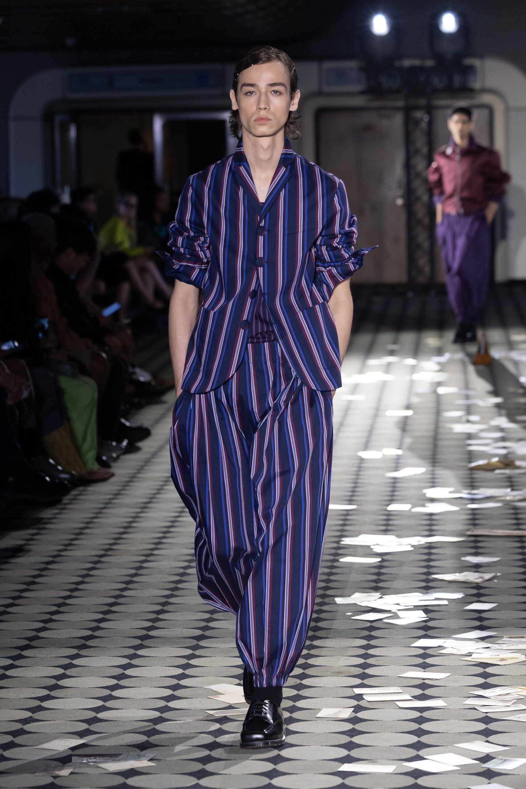 striped blue and red suit