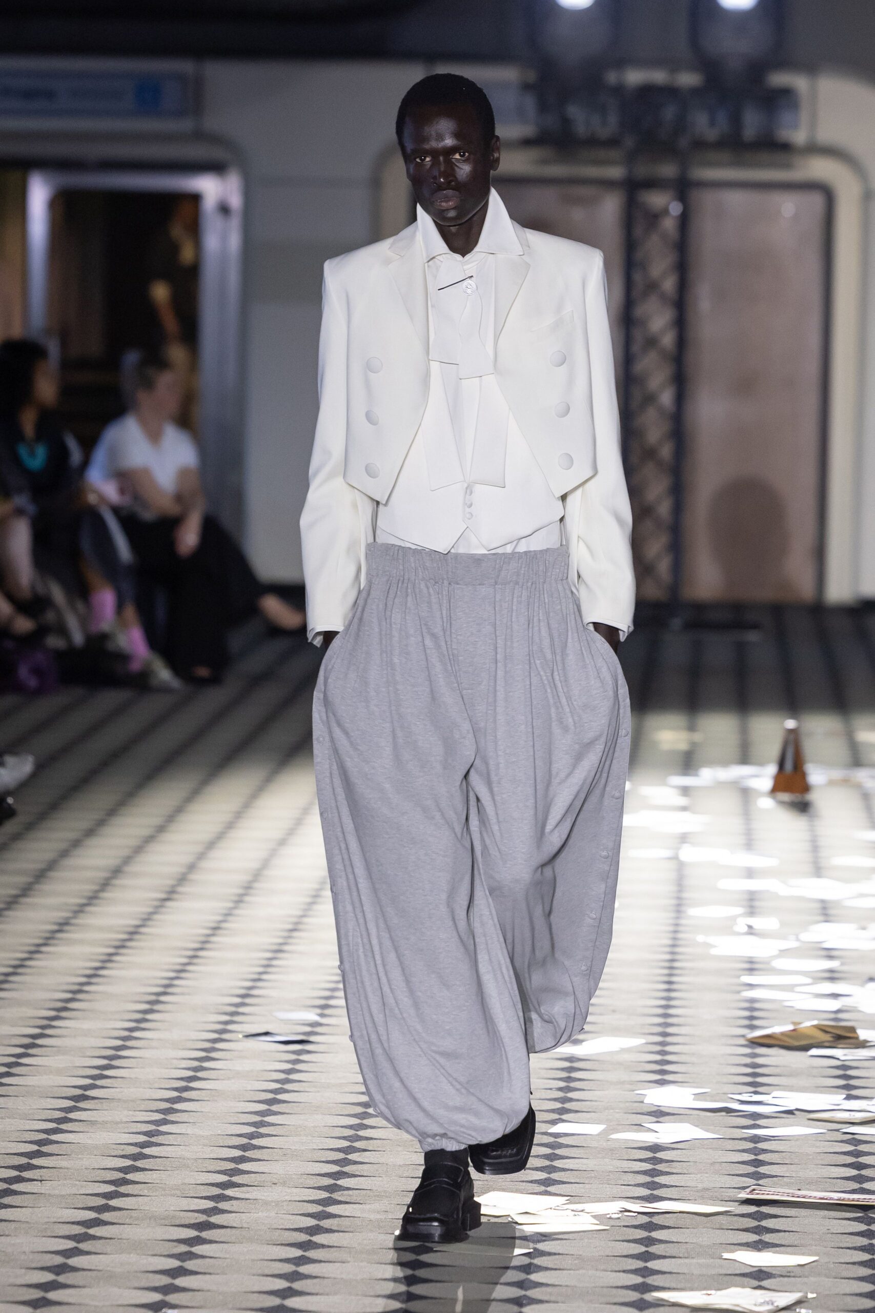 white blazer gray pants