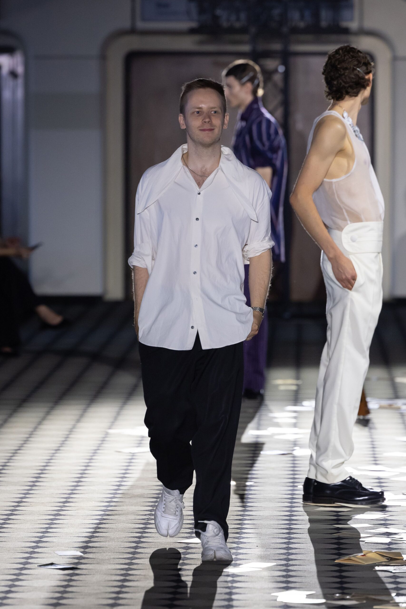 white relaxed shirt with black pants
