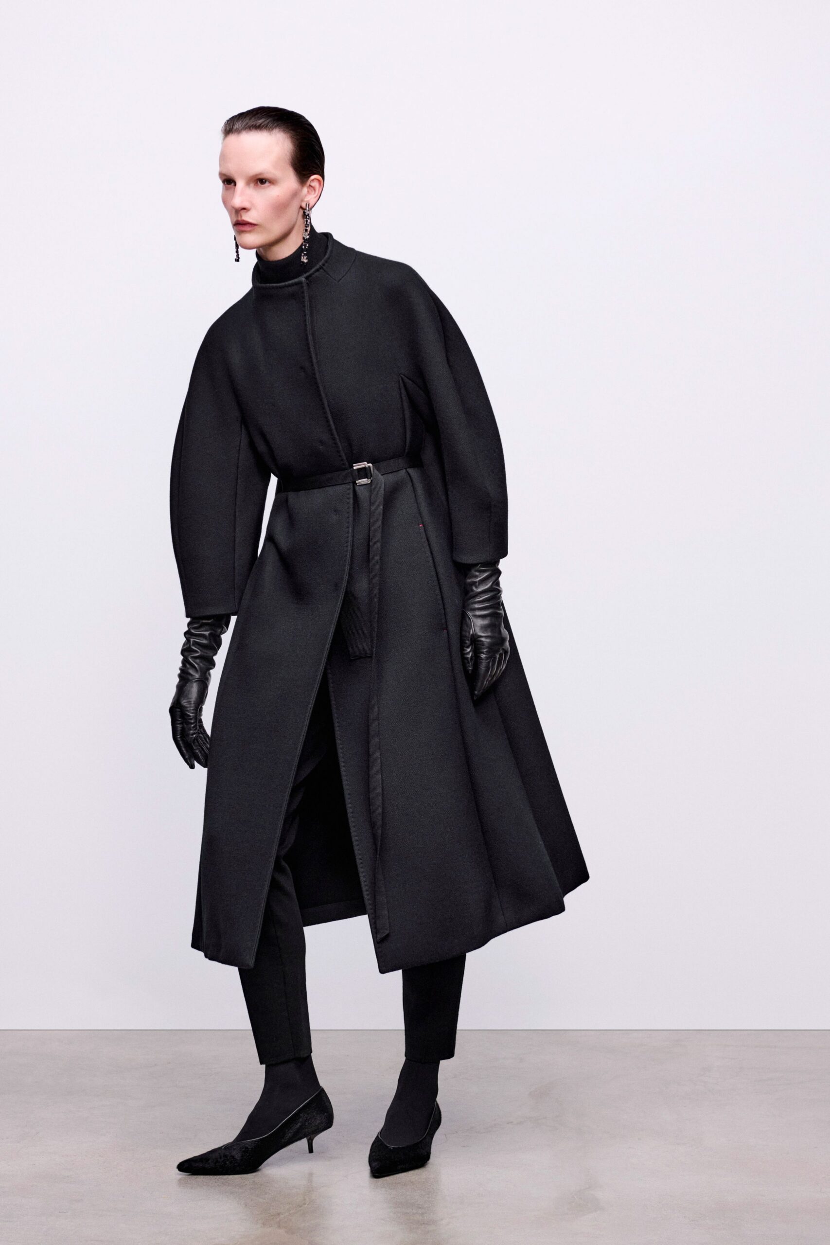 black wool long-sleeve collared structured zippered belted coat